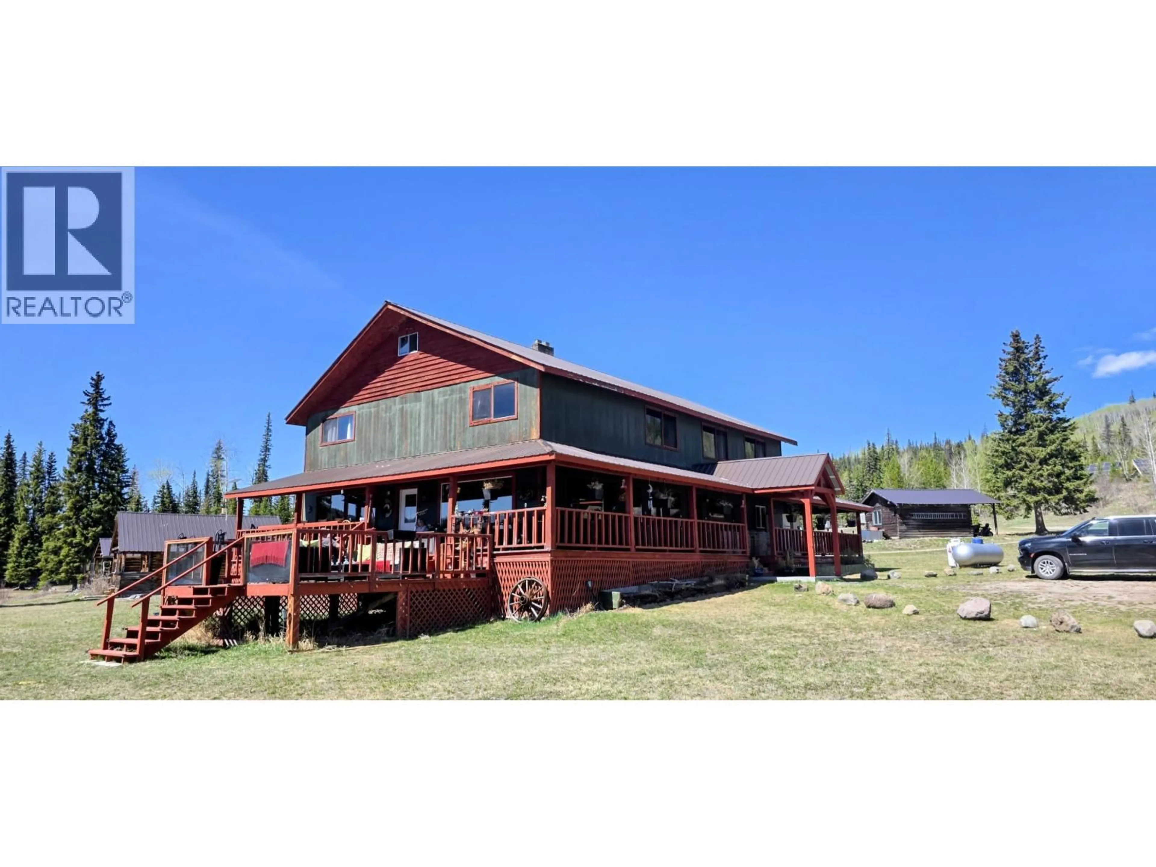 A pic from outside/outdoor area/front of a property/back of a property/a pic from drone, unknown for 14167 BATNUNI ROAD, Vanderhoof British Columbia V2J3H9