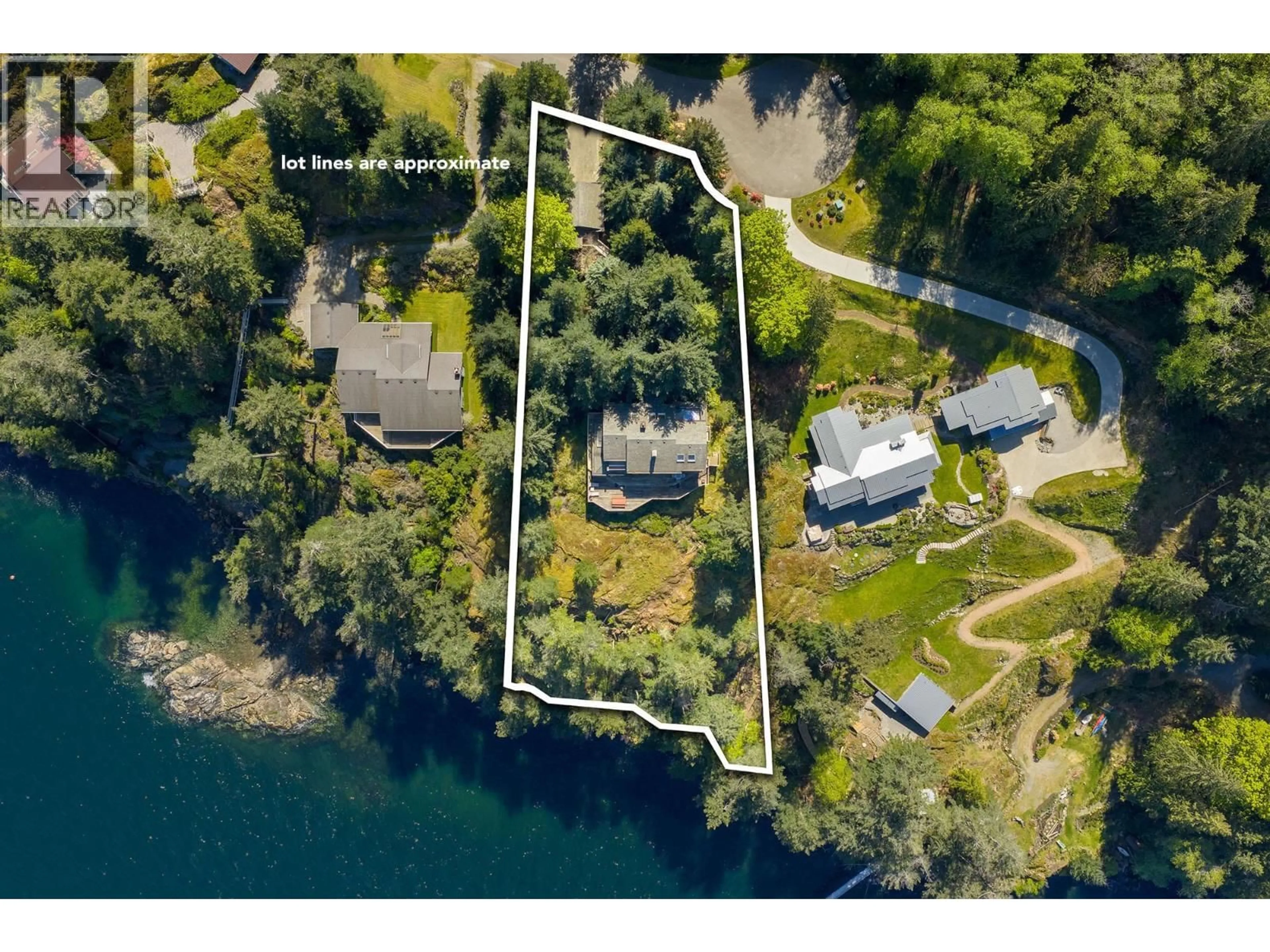 A pic from outside/outdoor area/front of a property/back of a property/a pic from drone, water/lake/river/ocean view for 520 SMUGGLERS COVE ROAD, Bowen Island British Columbia V0N1G1