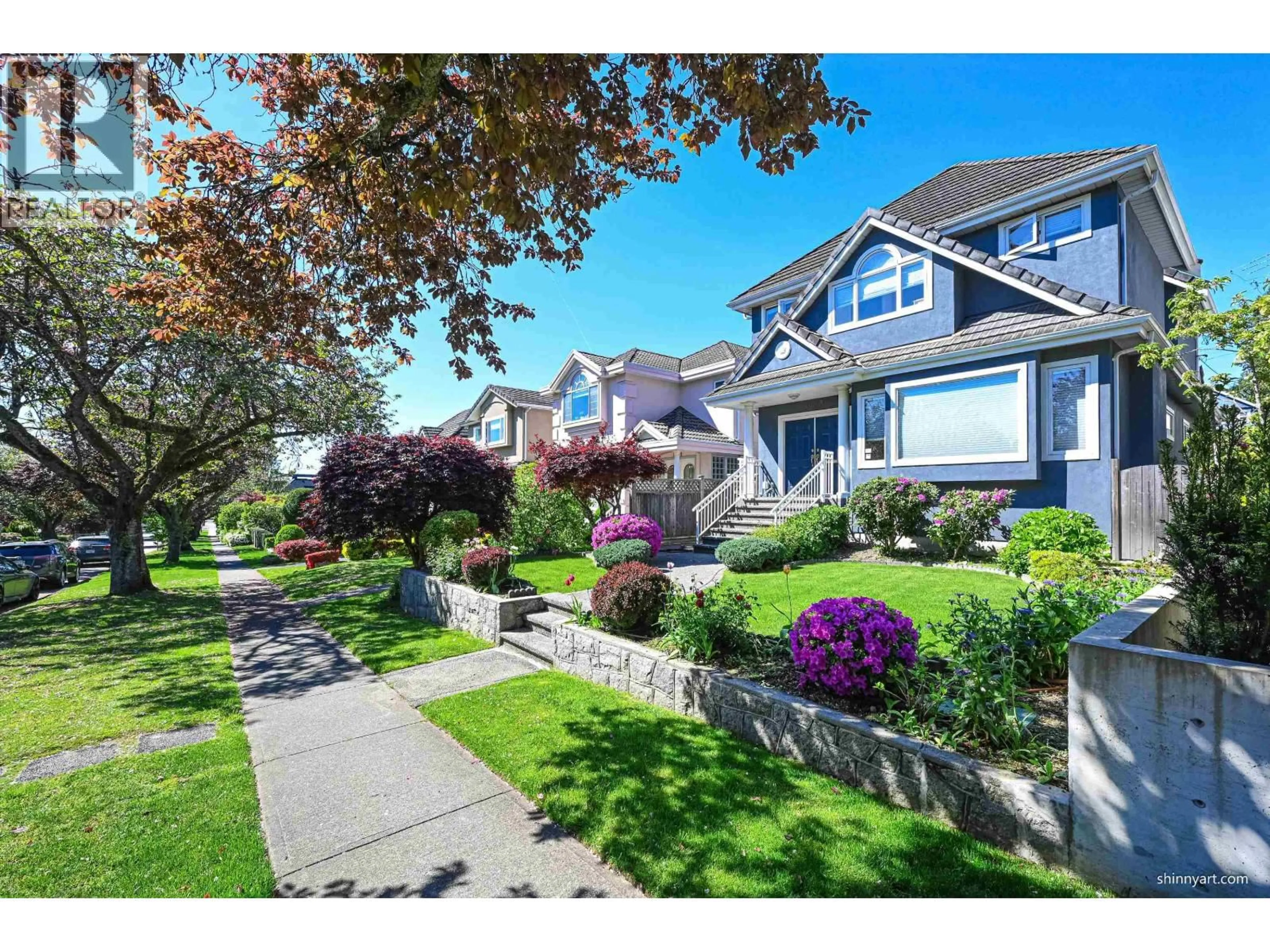Home with vinyl exterior material, street for 1933 42ND AVENUE, Vancouver British Columbia V6M2B2
