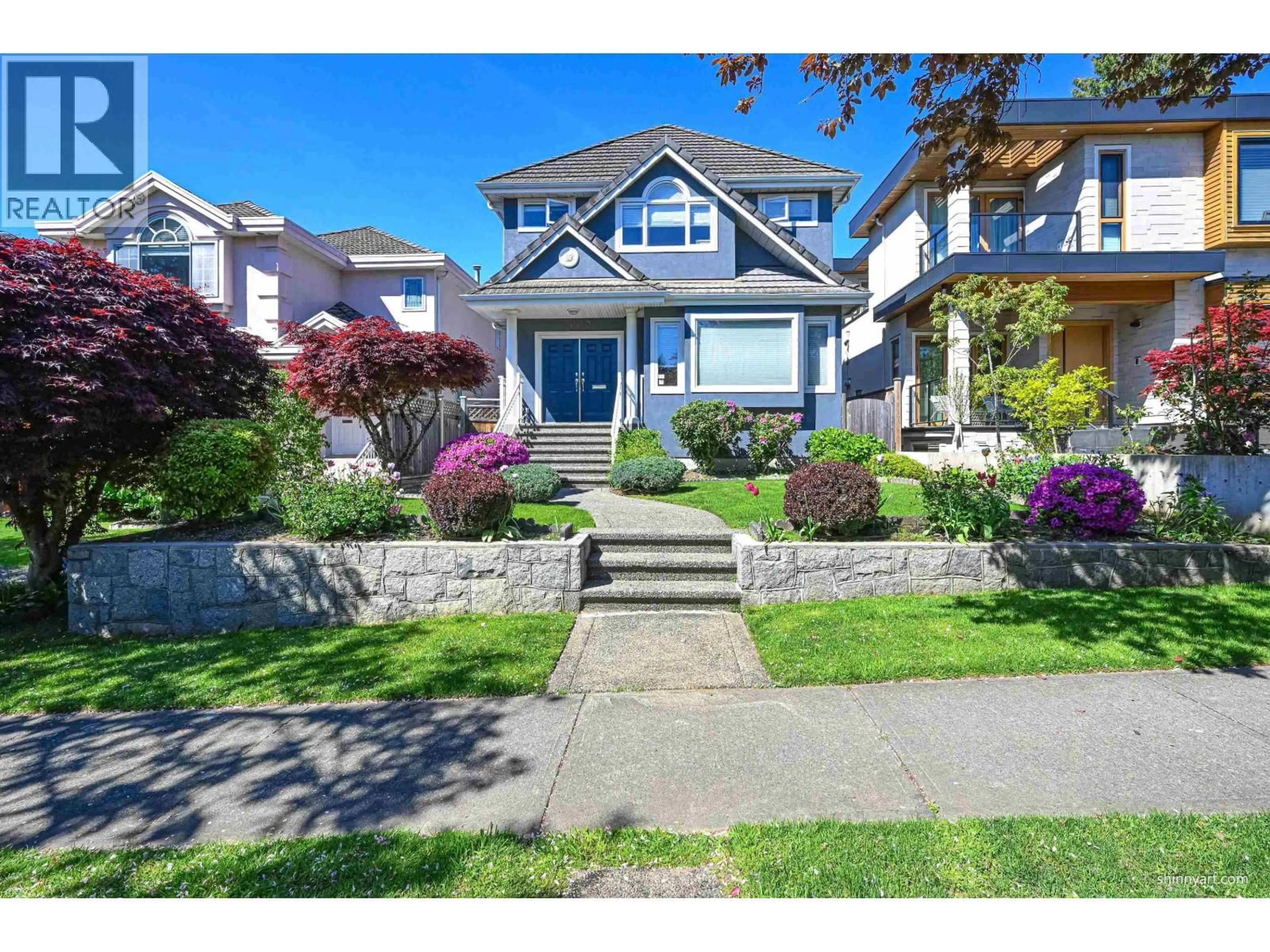 Home with vinyl exterior material, street for 1933 42ND AVENUE, Vancouver British Columbia V6M2B2