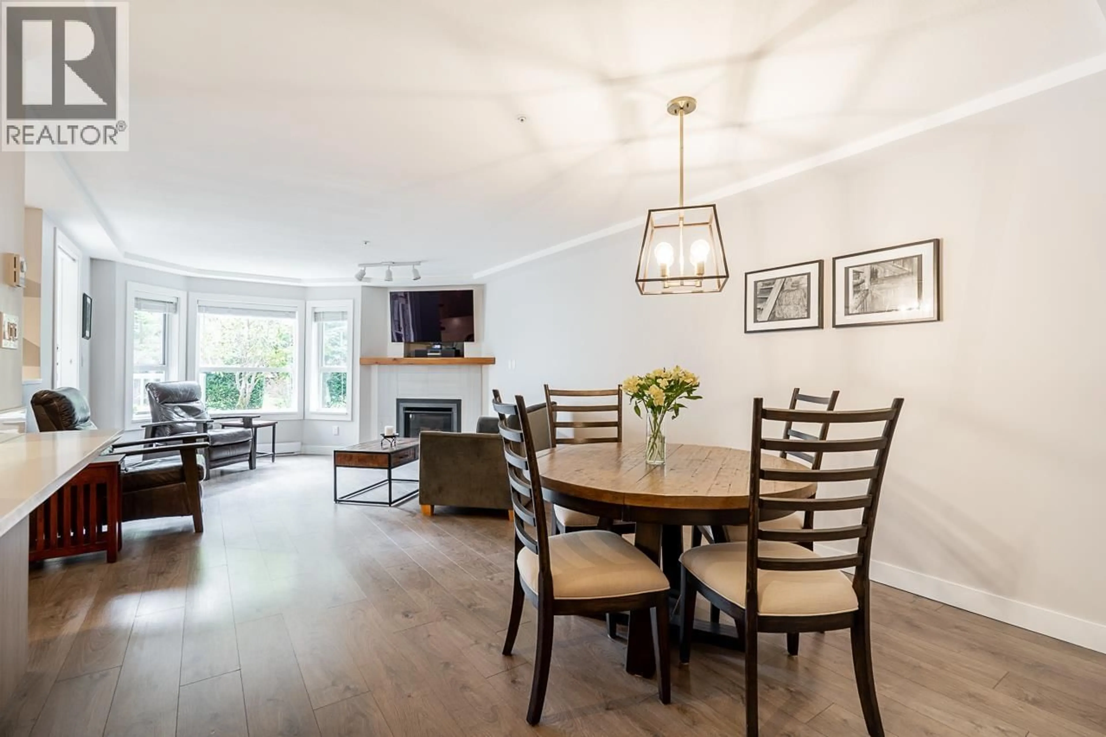 Dining room, wood/laminate floor for 107 - 1283 PARKGATE AVENUE, North Vancouver British Columbia V7H3A3