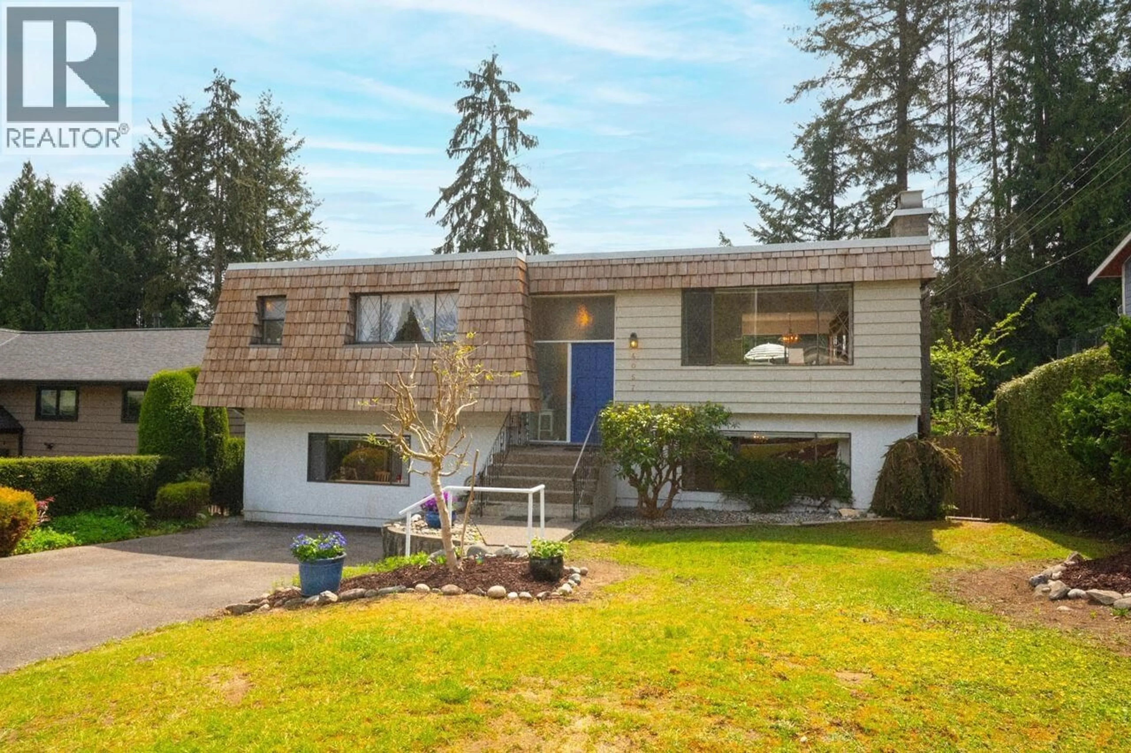 Home with vinyl exterior material, street for 4057 VIOLET STREET, North Vancouver British Columbia V7G1E4