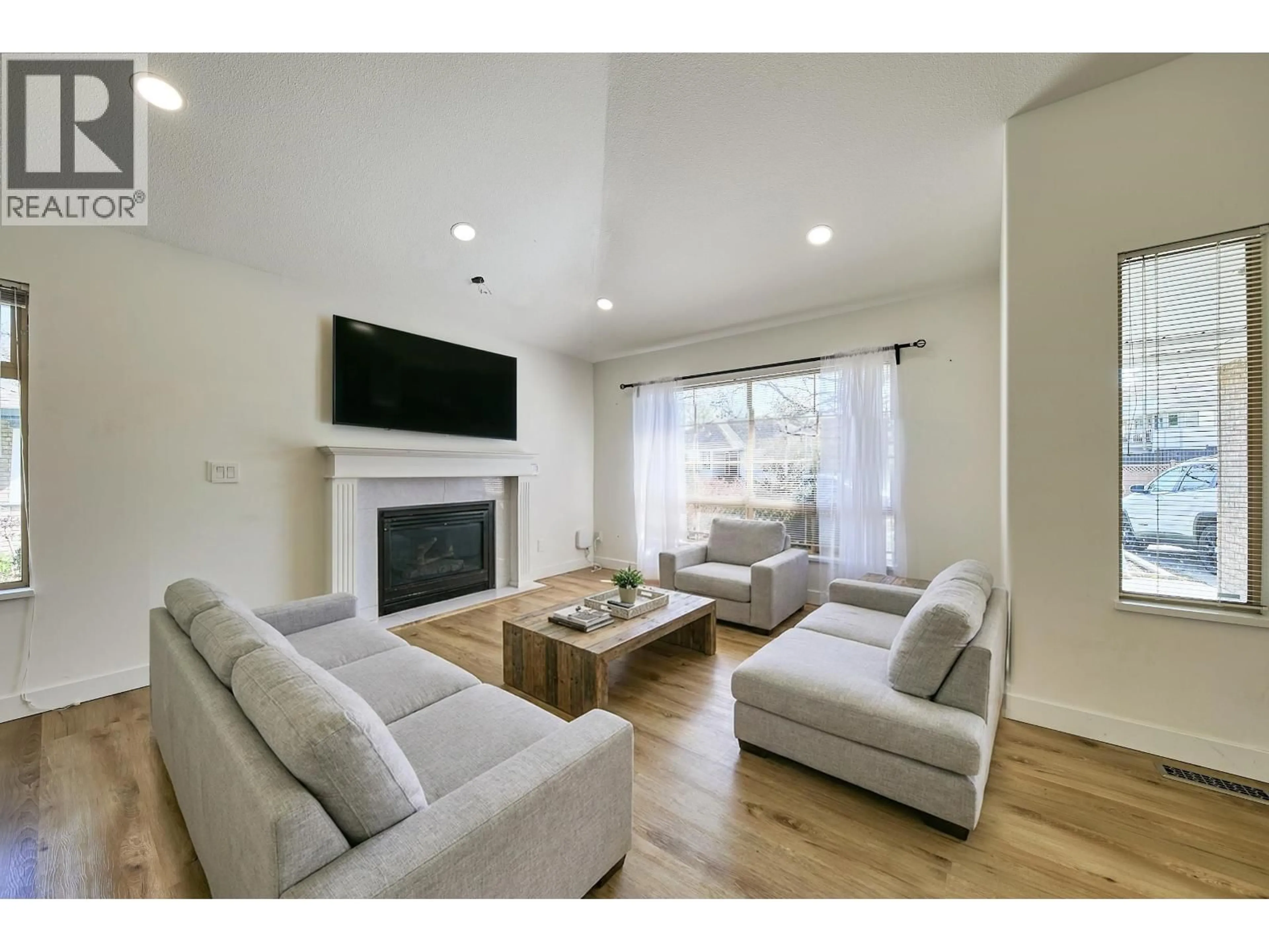 Living room with furniture, wood/laminate floor for 23015 124B AVENUE, Maple Ridge British Columbia V2X0X2