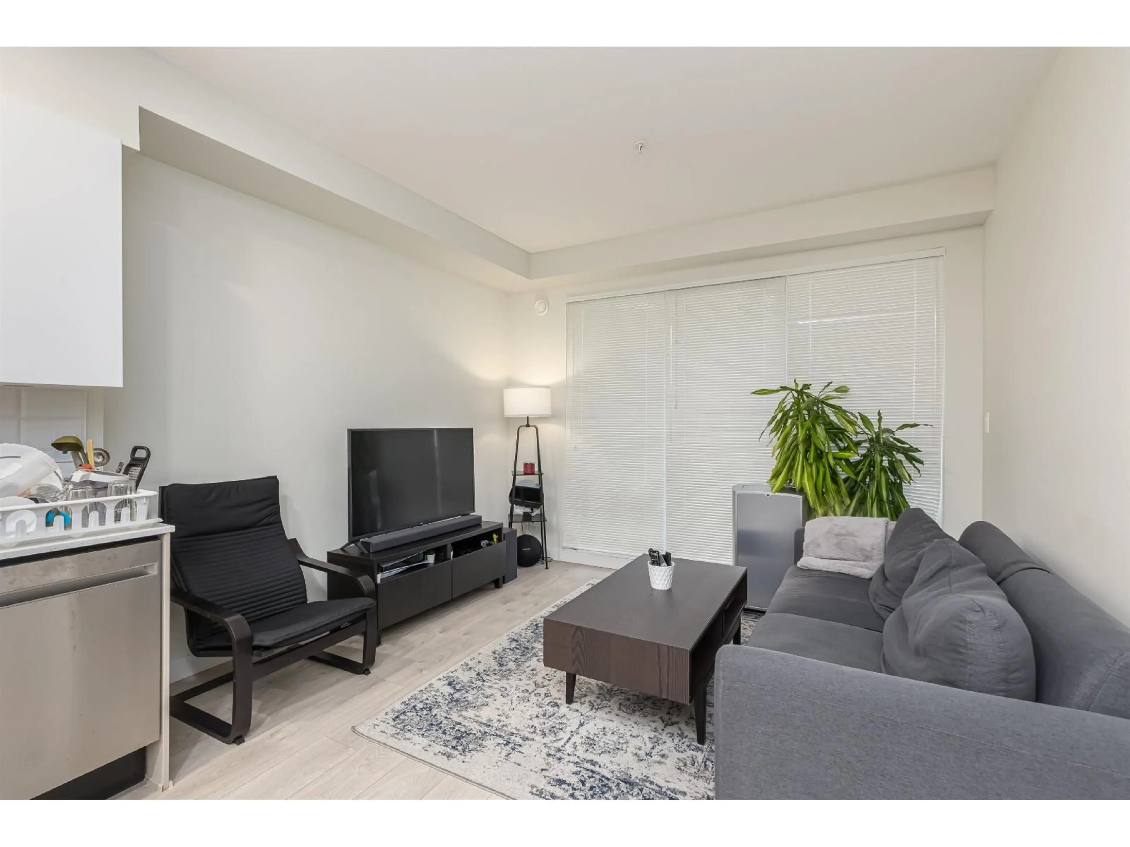 Living room with furniture, unknown for 406 - 10838 WHALLEY BOULEVARD, Surrey British Columbia V3R0G8