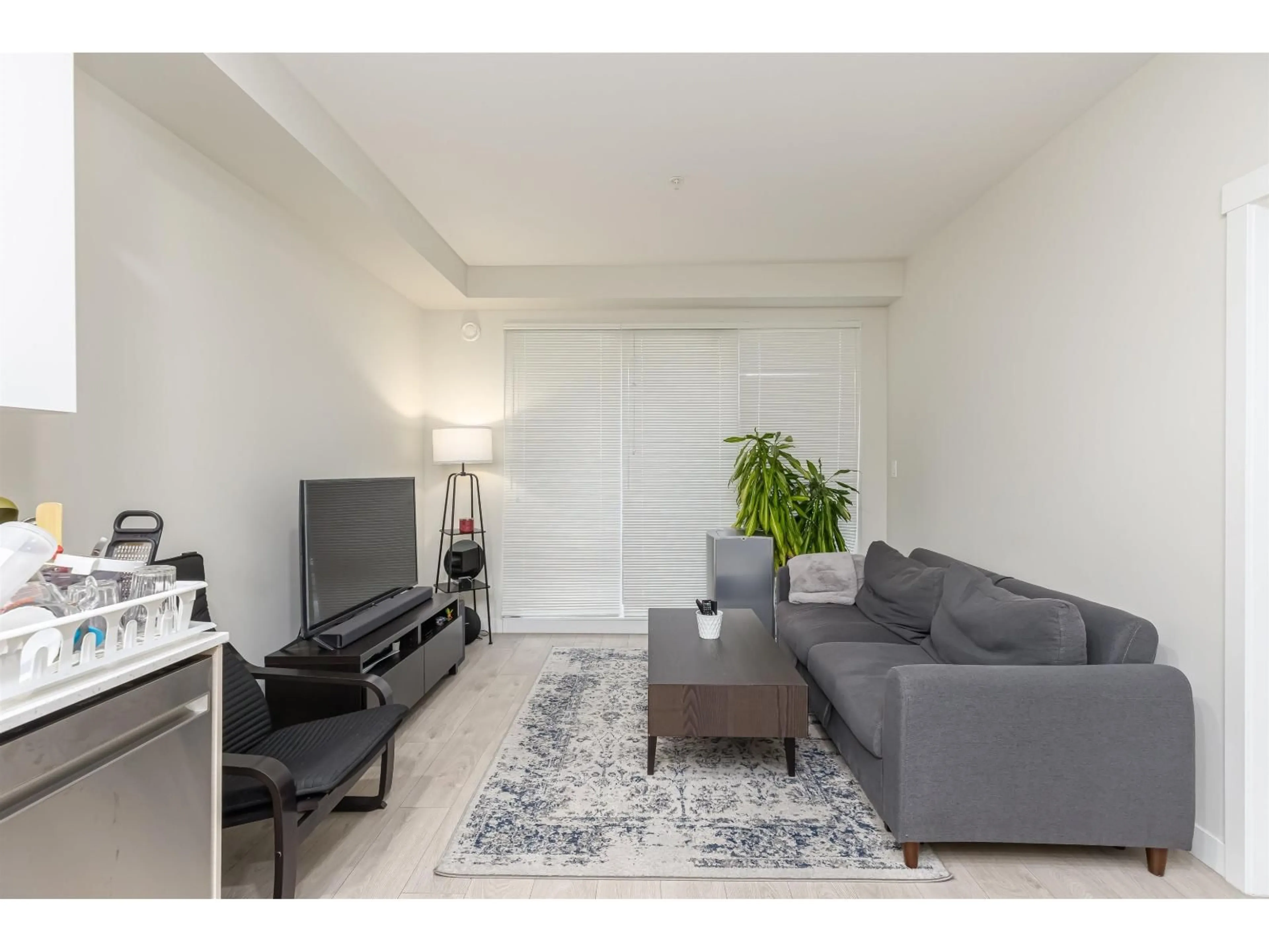 Living room with furniture, unknown for 406 - 10838 WHALLEY BOULEVARD, Surrey British Columbia V3R0G8
