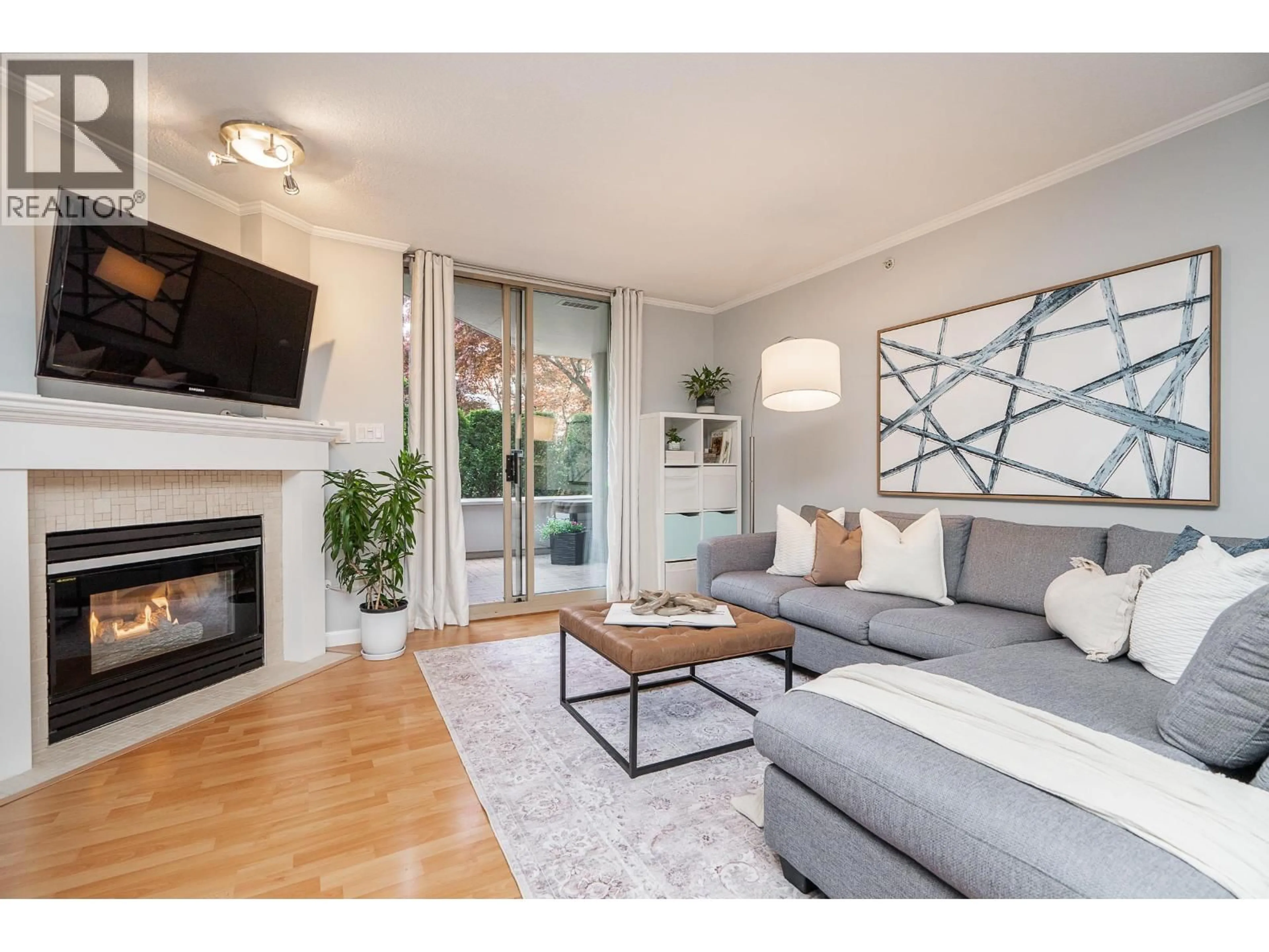 Living room with furniture, wood/laminate floor for 103 - 1199 EASTWOOD STREET, Coquitlam British Columbia V3B7W7