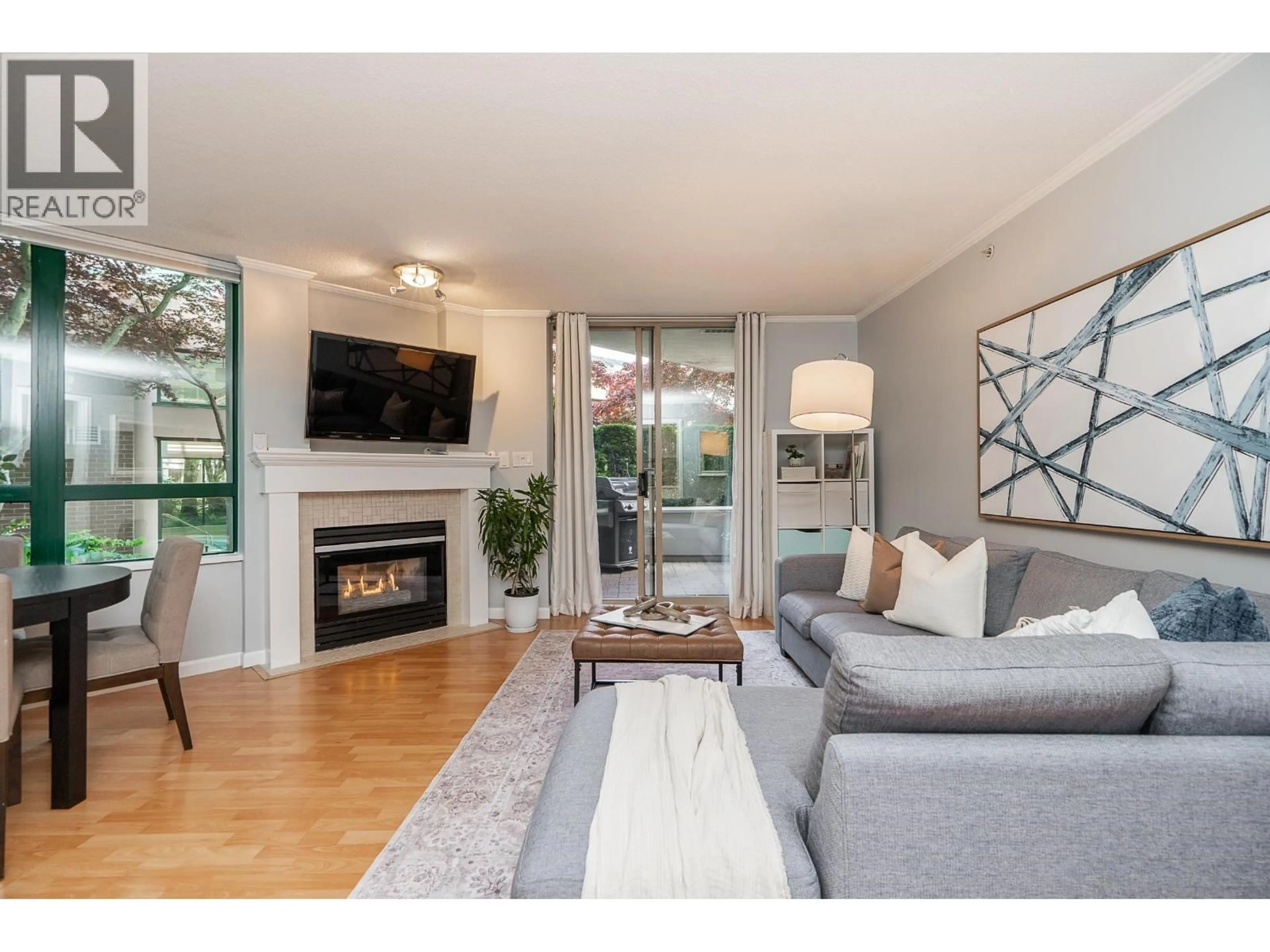 Living room with furniture, wood/laminate floor for 103 - 1199 EASTWOOD STREET, Coquitlam British Columbia V3B7W7