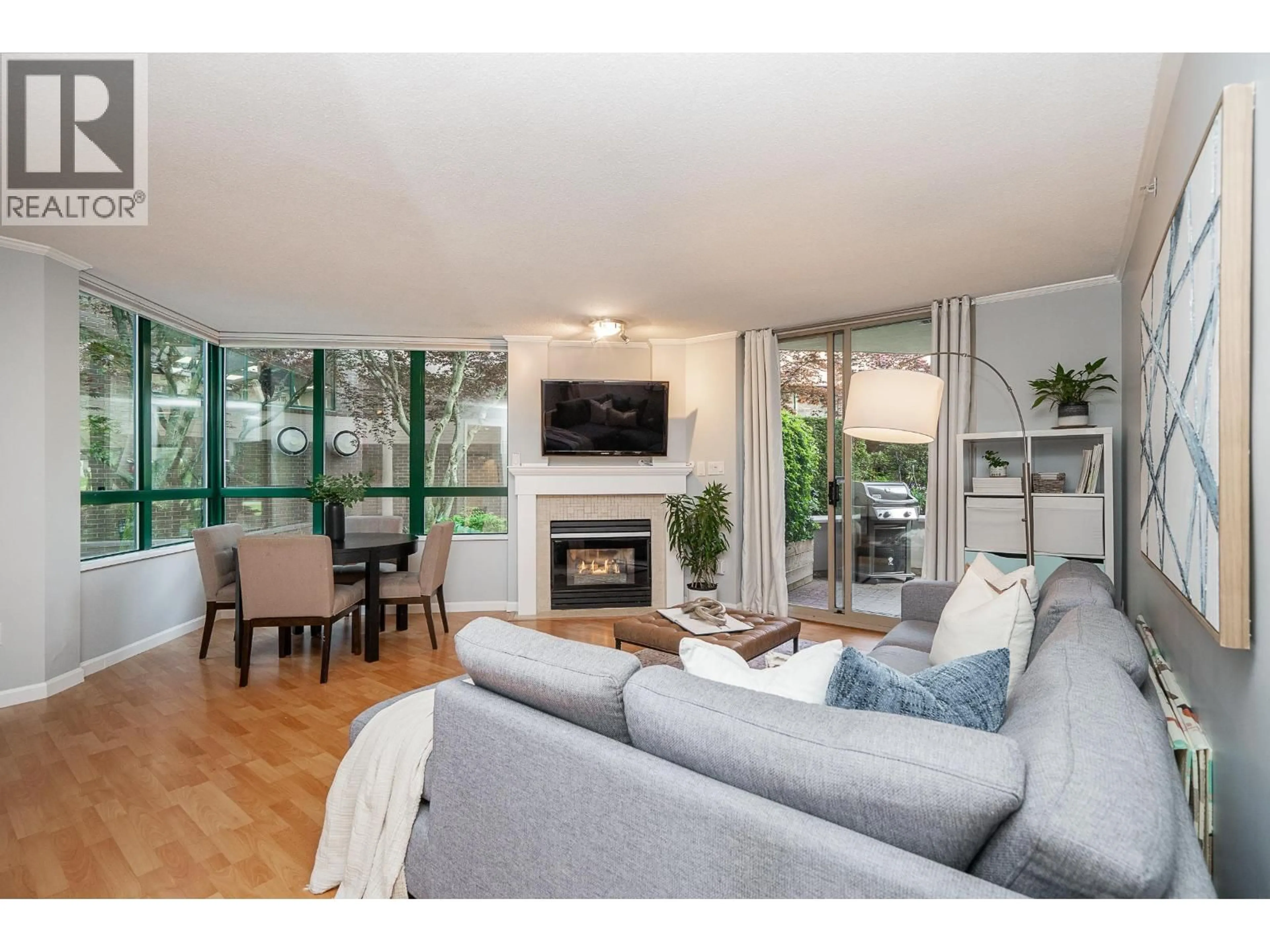 Living room with furniture, wood/laminate floor for 103 - 1199 EASTWOOD STREET, Coquitlam British Columbia V3B7W7