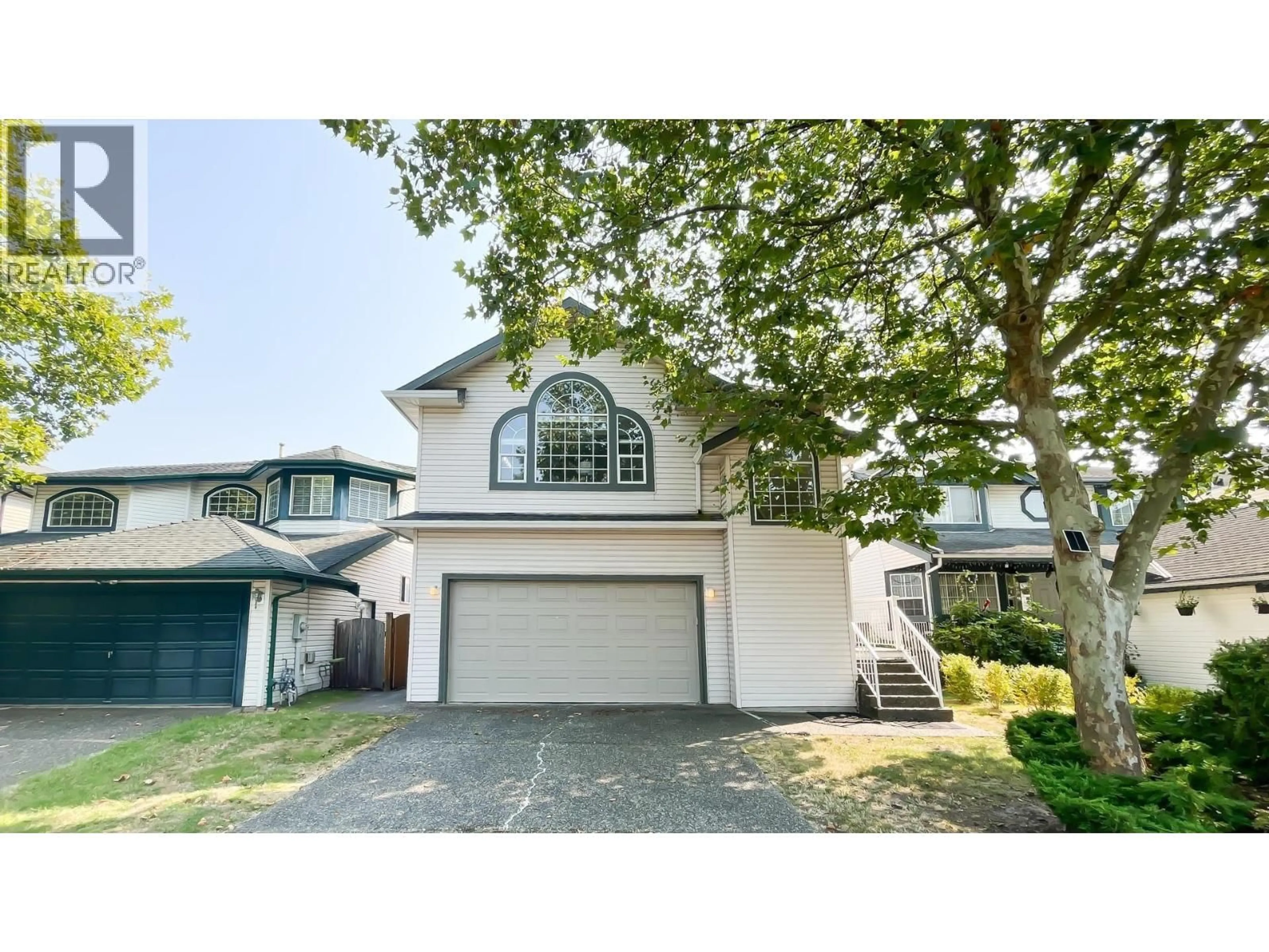 Home with vinyl exterior material, street for 5240 OLIVER DRIVE, Richmond British Columbia V6V2S8