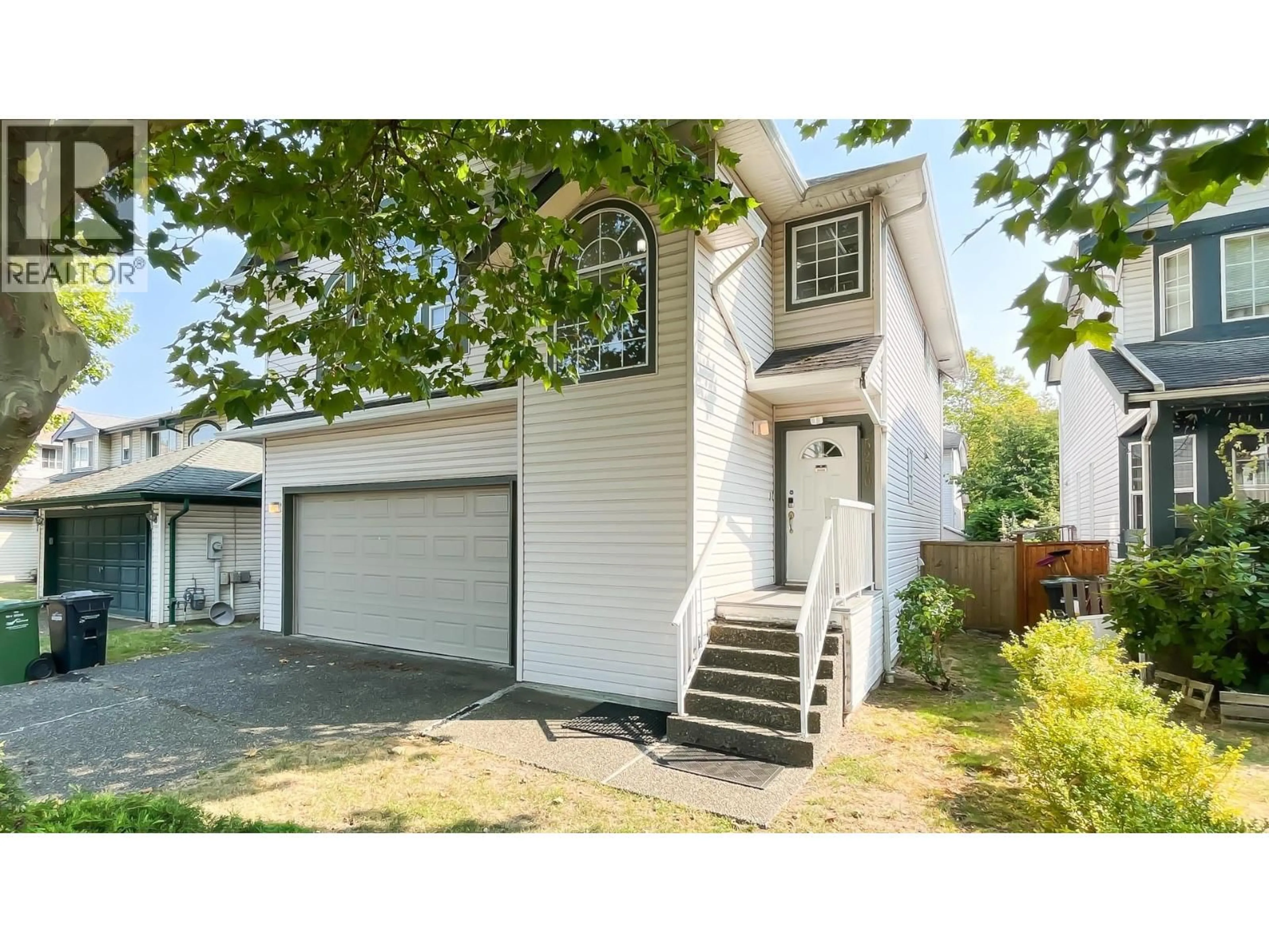 Home with vinyl exterior material, street for 5240 OLIVER DRIVE, Richmond British Columbia V6V2S8