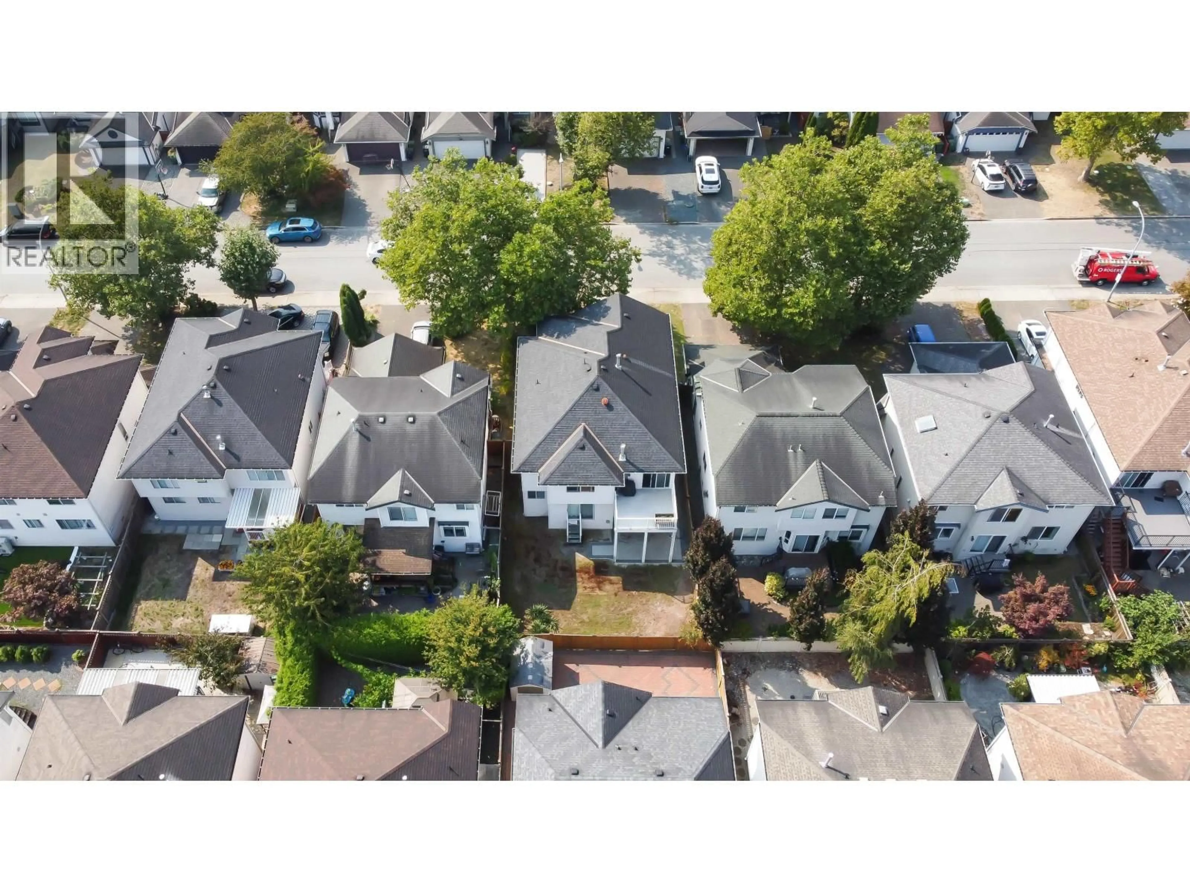 A pic from outside/outdoor area/front of a property/back of a property/a pic from drone, street for 5240 OLIVER DRIVE, Richmond British Columbia V6V2S8