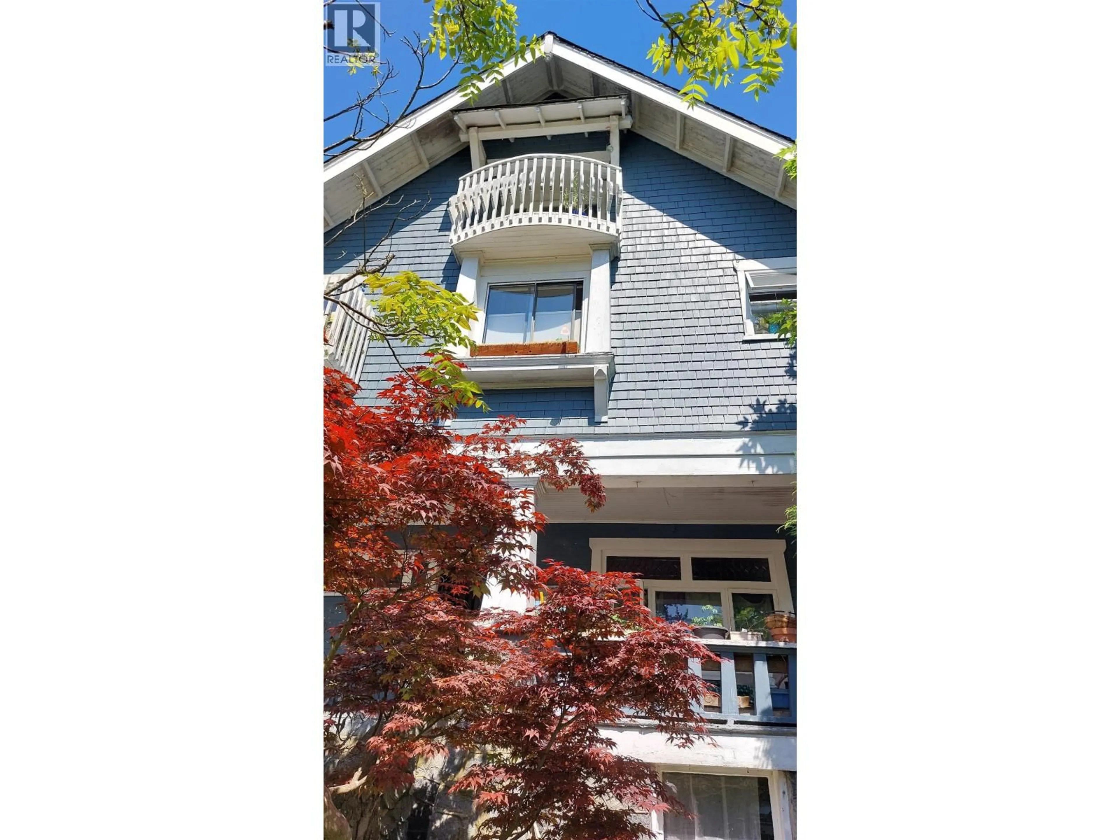 Home with vinyl exterior material, street for 1951 NAPIER STREET, Vancouver British Columbia V5L2N6