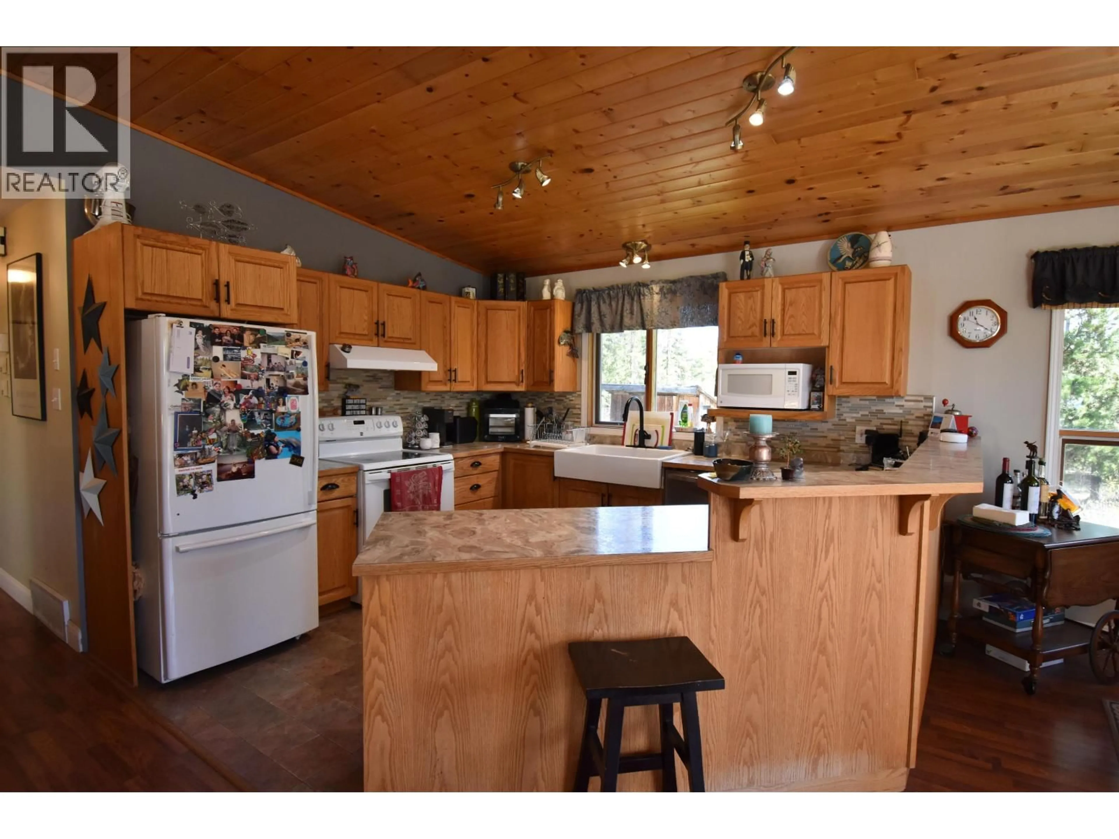 Open concept kitchen, wood/laminate floor for 3253 CHAPMAN ROAD, Smithers British Columbia V0J2N5