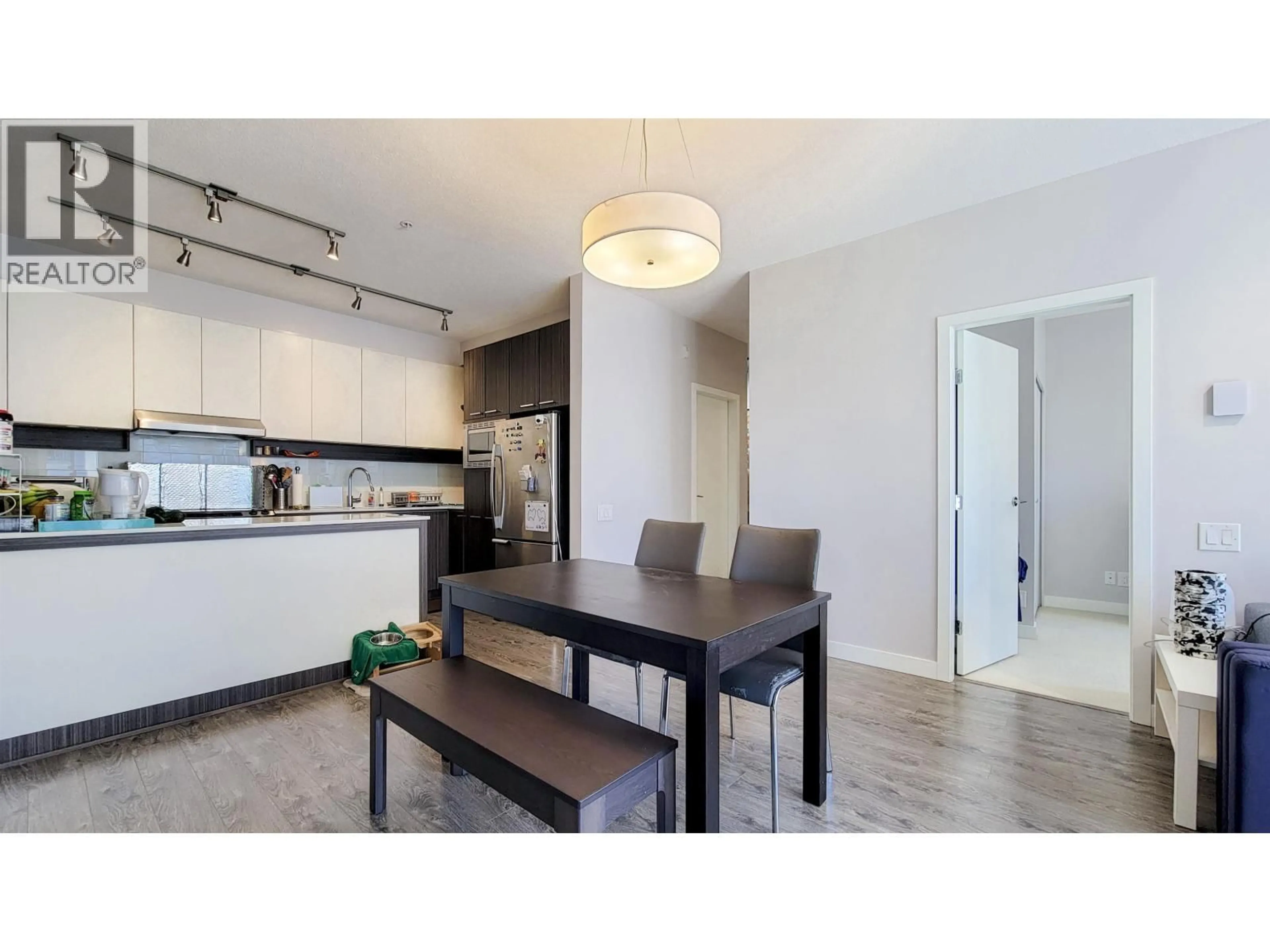 Open concept kitchen, wood/laminate floor for 307 - 555 FOSTER AVENUE, Coquitlam British Columbia V3J0B6