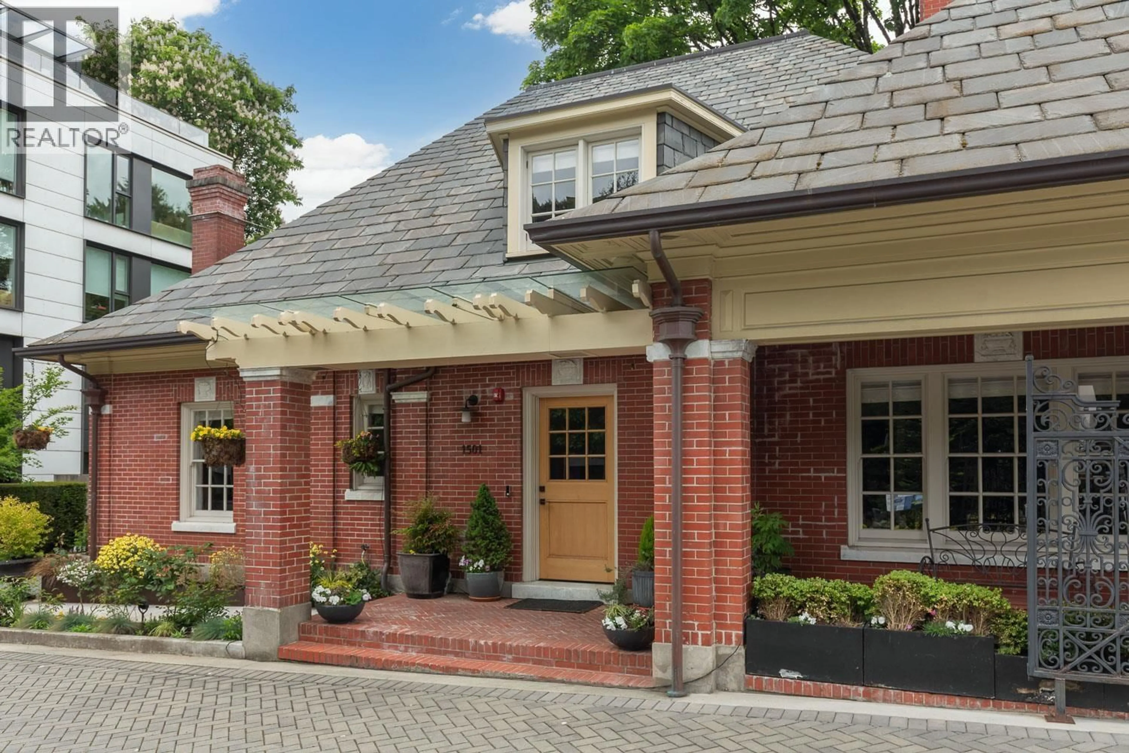 Home with brick exterior material, street for 1501 ATLAS LANE, Vancouver British Columbia V6P0C9