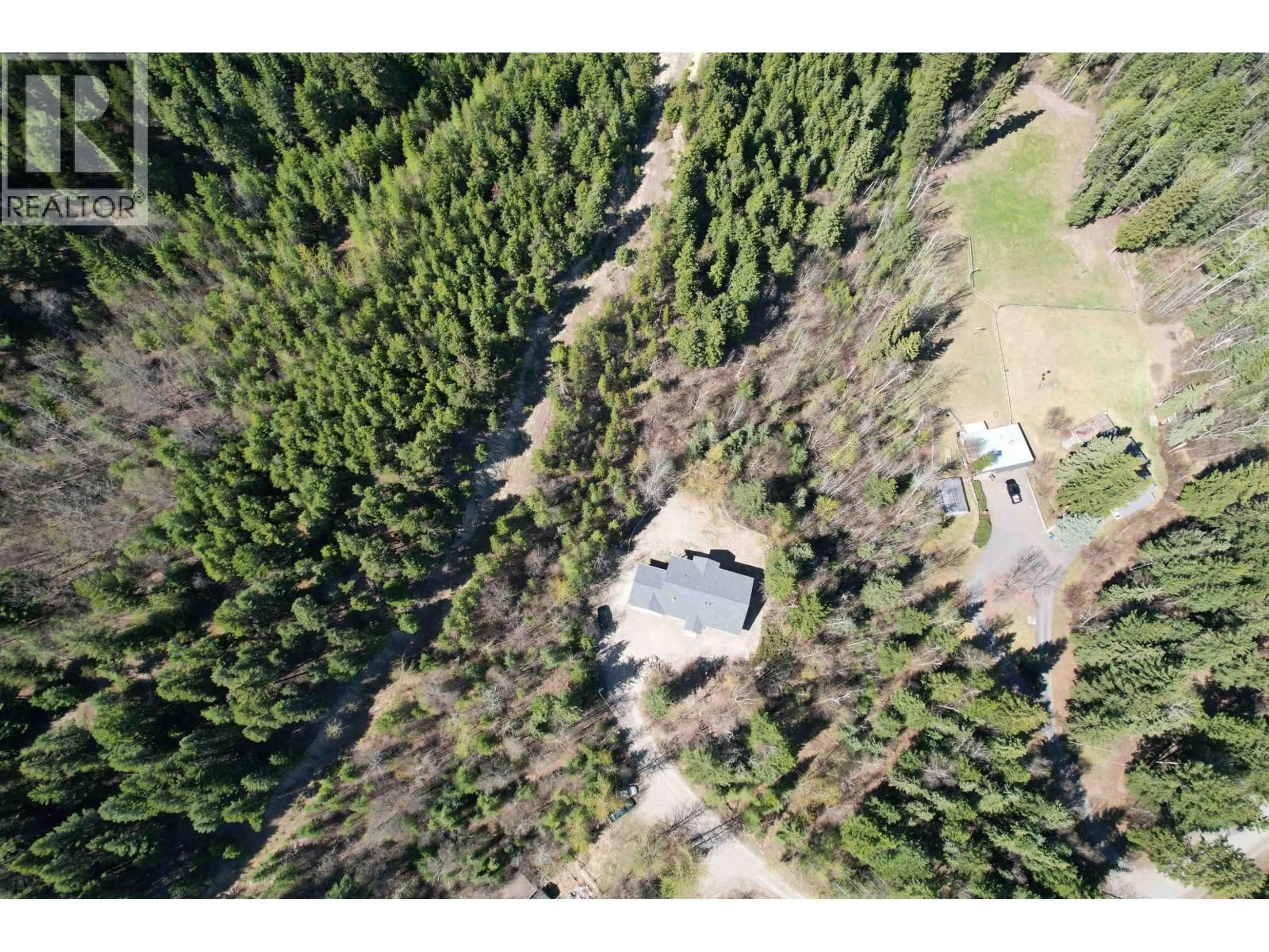 A pic from outside/outdoor area/front of a property/back of a property/a pic from drone, forest/trees view for 1980 HIGDON ROAD, Quesnel British Columbia V2J6J6