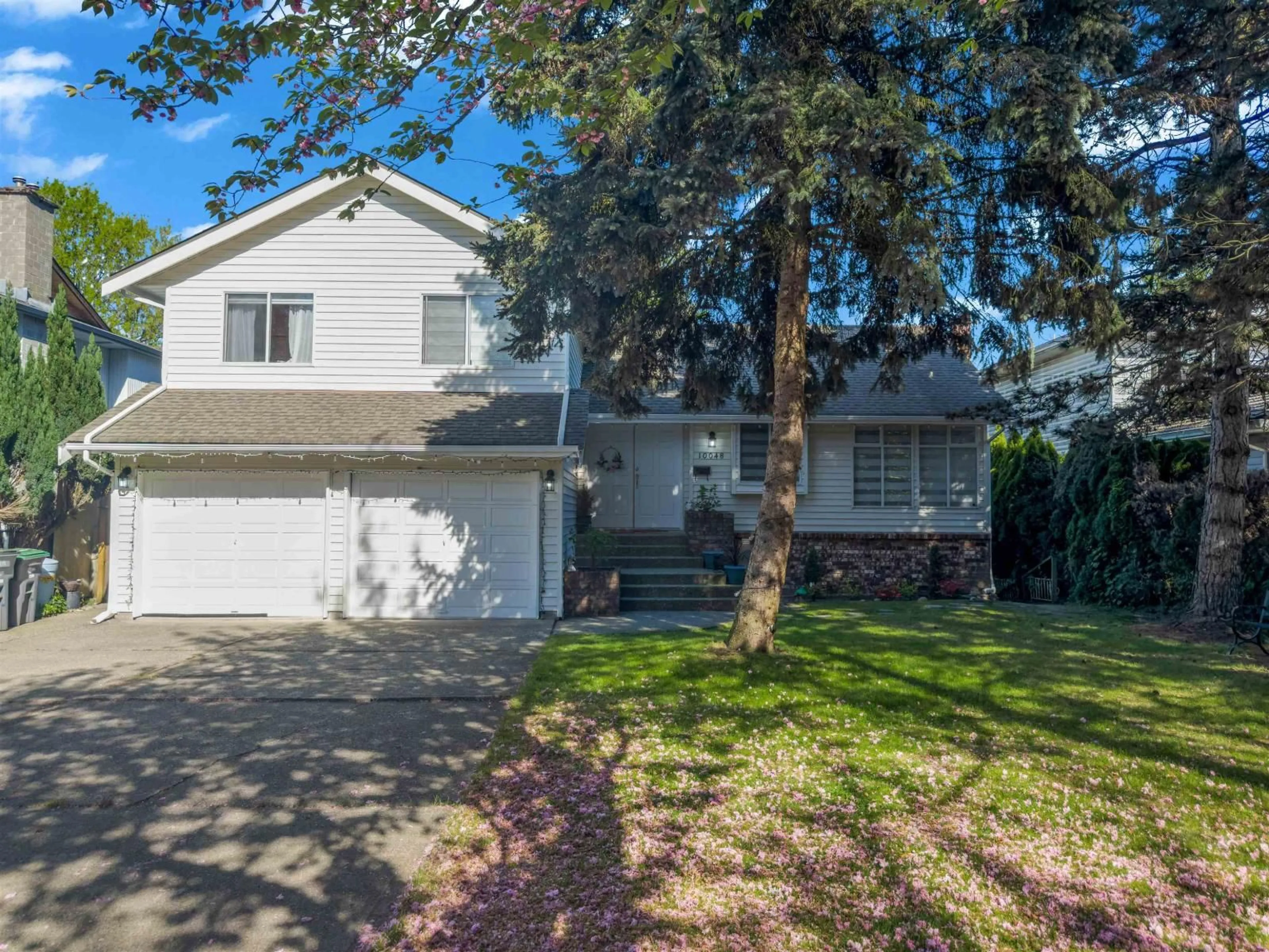 Home with vinyl exterior material, street for 10048 157 STREET, Surrey British Columbia V4N2R9