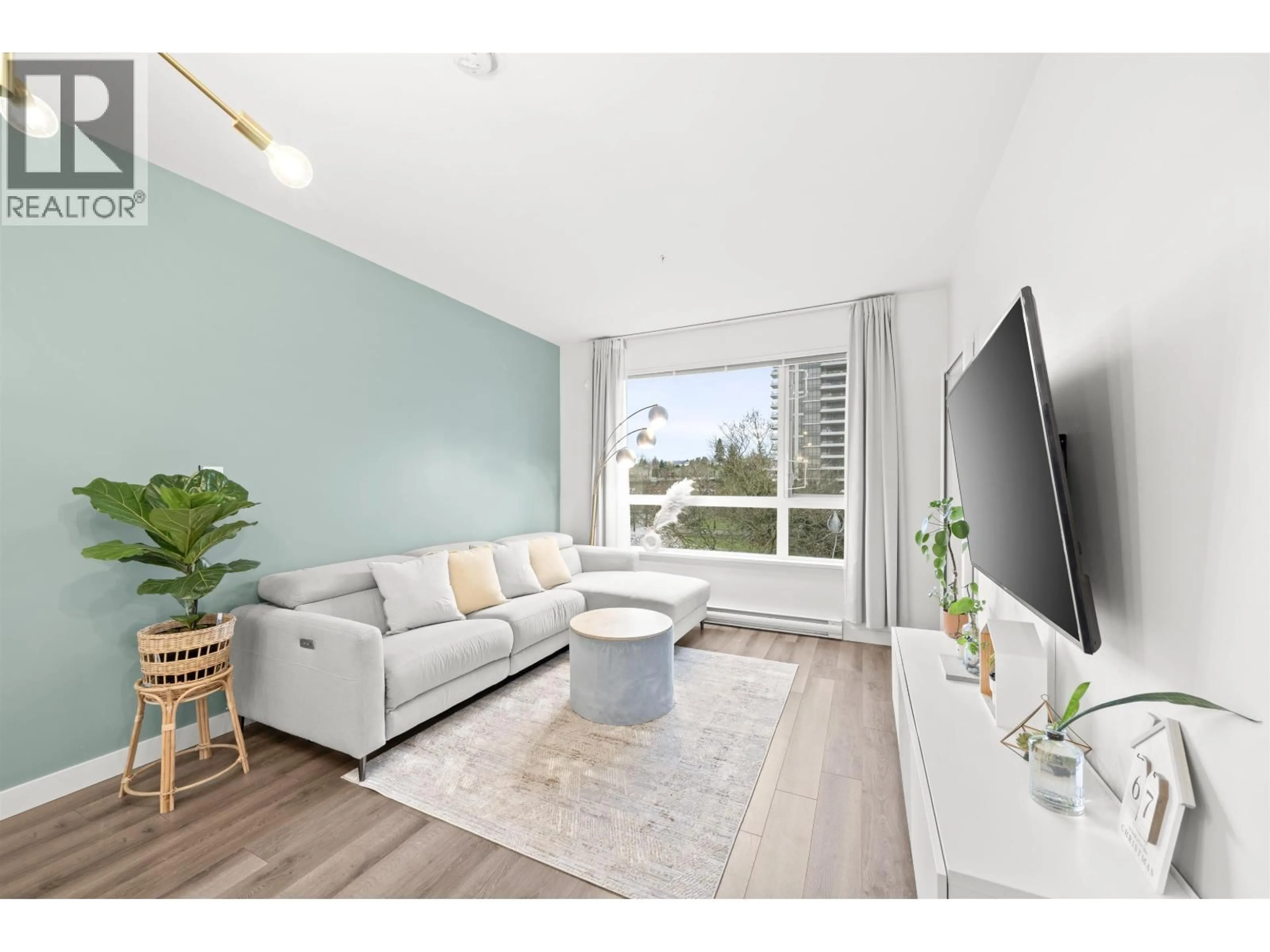 Living room with furniture, wood/laminate floor for 515 - 2188 MADISON AVENUE, Burnaby British Columbia V5C0J8