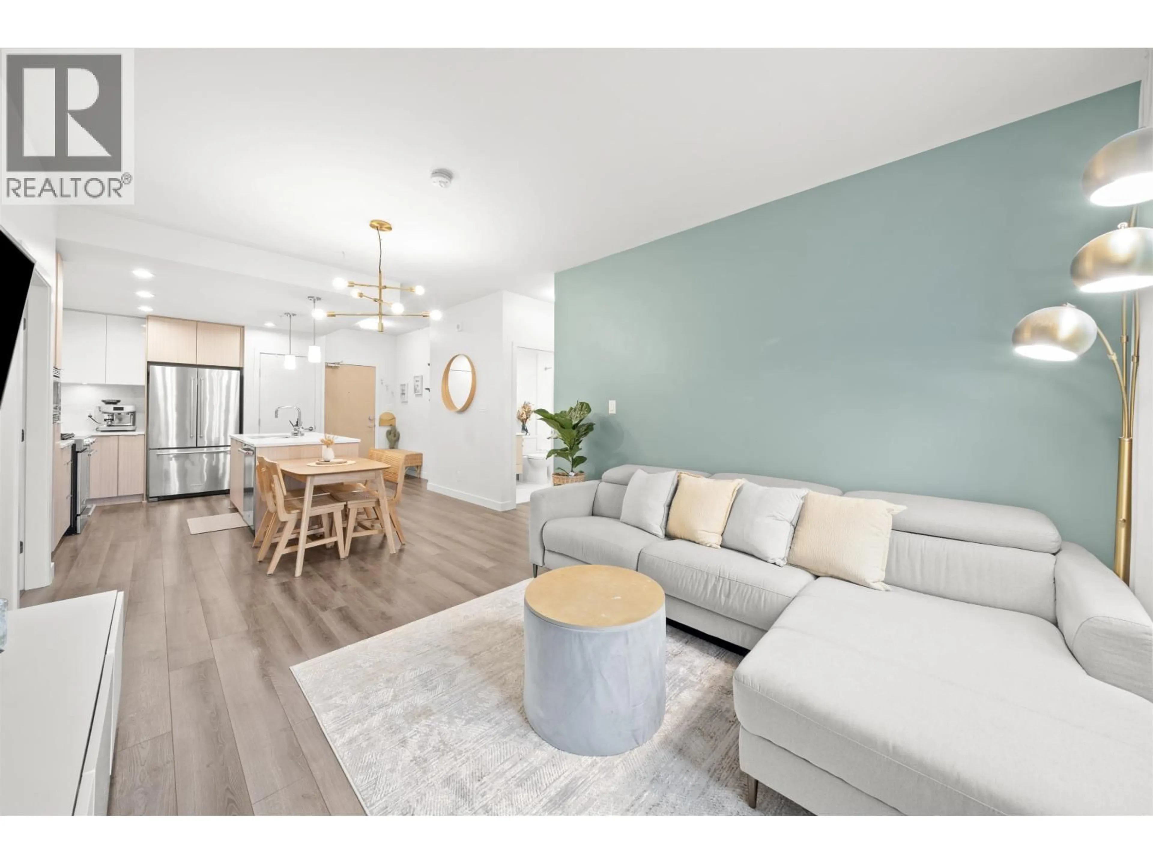 Living room with furniture, wood/laminate floor for 515 - 2188 MADISON AVENUE, Burnaby British Columbia V5C0J8