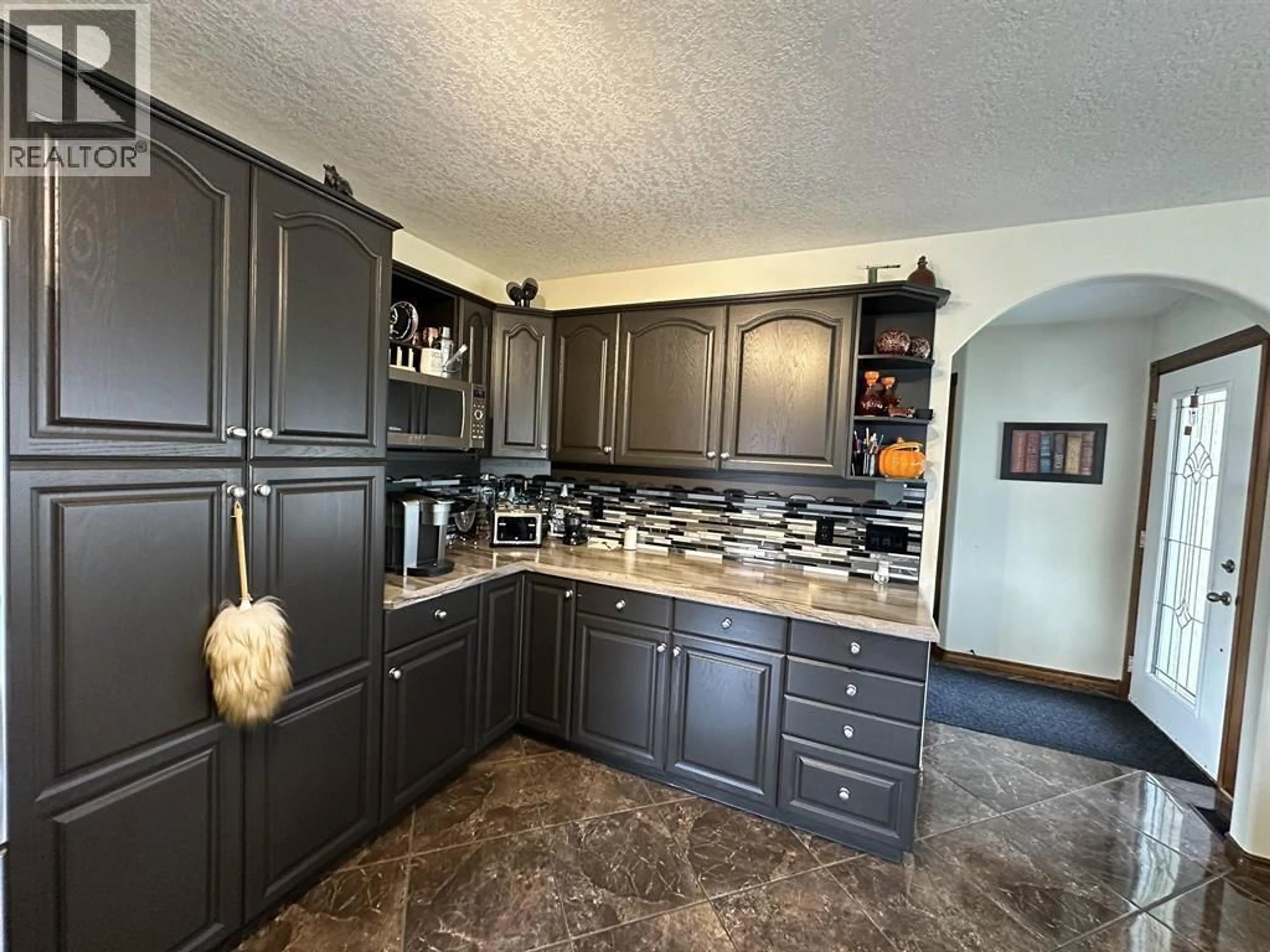 Open concept kitchen, ceramic/tile floor for 10903 112 AVENUE, Fort St. John British Columbia V1J6R7