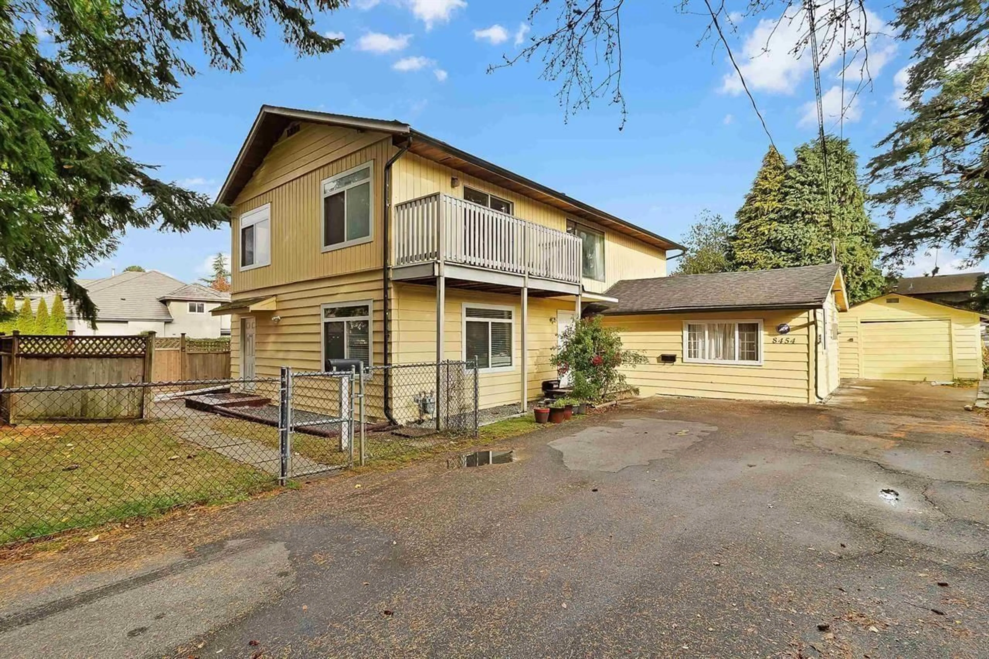 Home with vinyl exterior material, street for 8454 BROOKE ROAD, Delta British Columbia V4C4G1