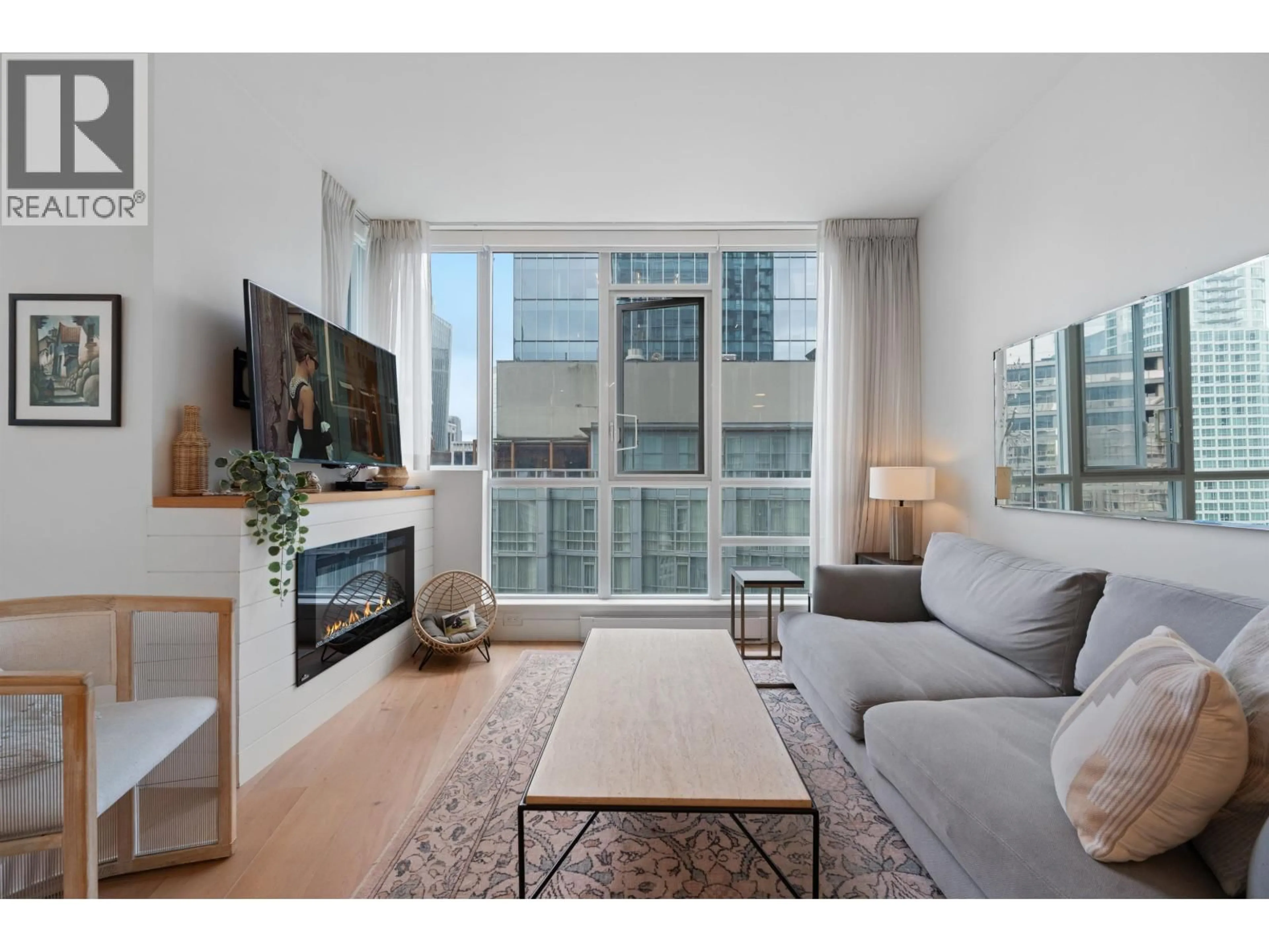 Living room with furniture, unknown for 1903 - 1189 MELVILLE STREET, Vancouver British Columbia V6E4T8