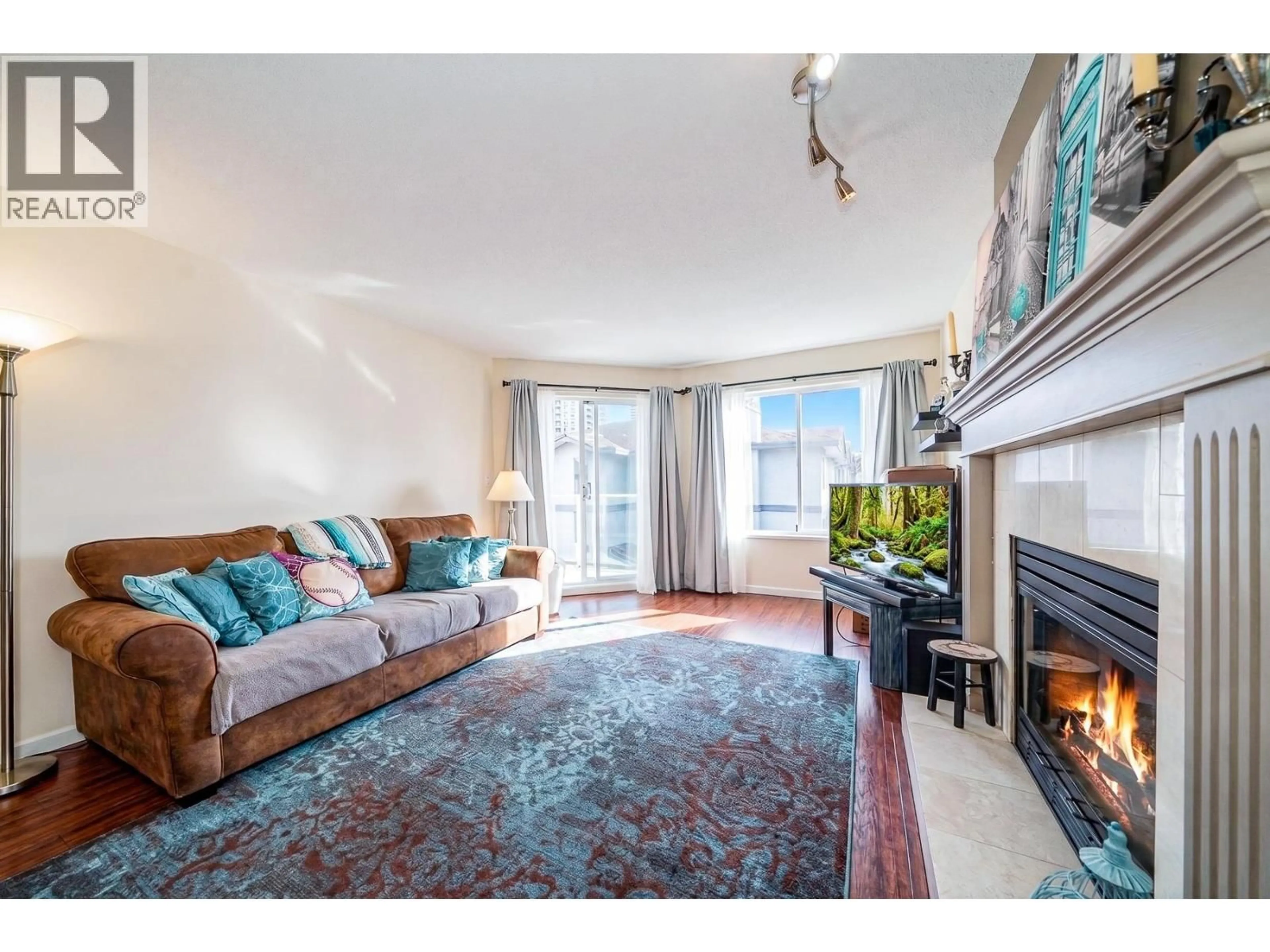 Living room with furniture, unknown for 305 - 1167 PIPELINE ROAD, Coquitlam British Columbia V3B4R9