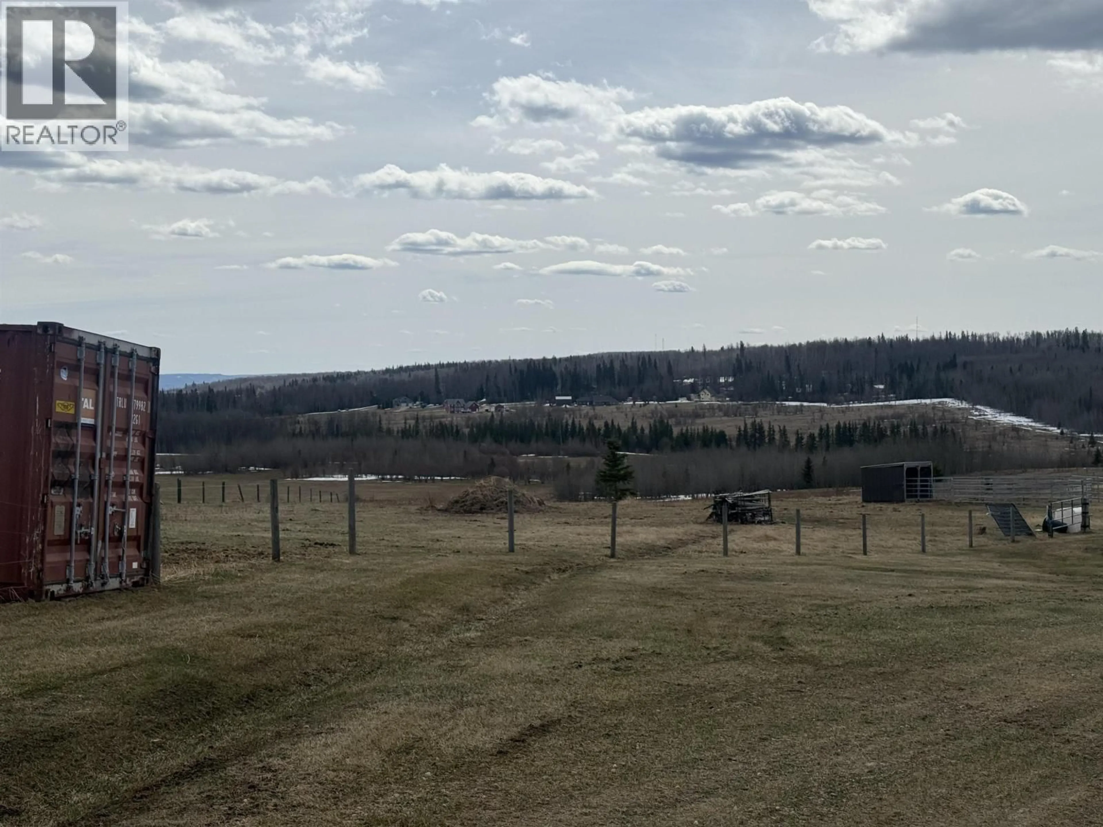 A pic from outside/outdoor area/front of a property/back of a property/a pic from drone, mountain view for 9344 97 HIGHWAY, Fort St. John British Columbia V0C1H0