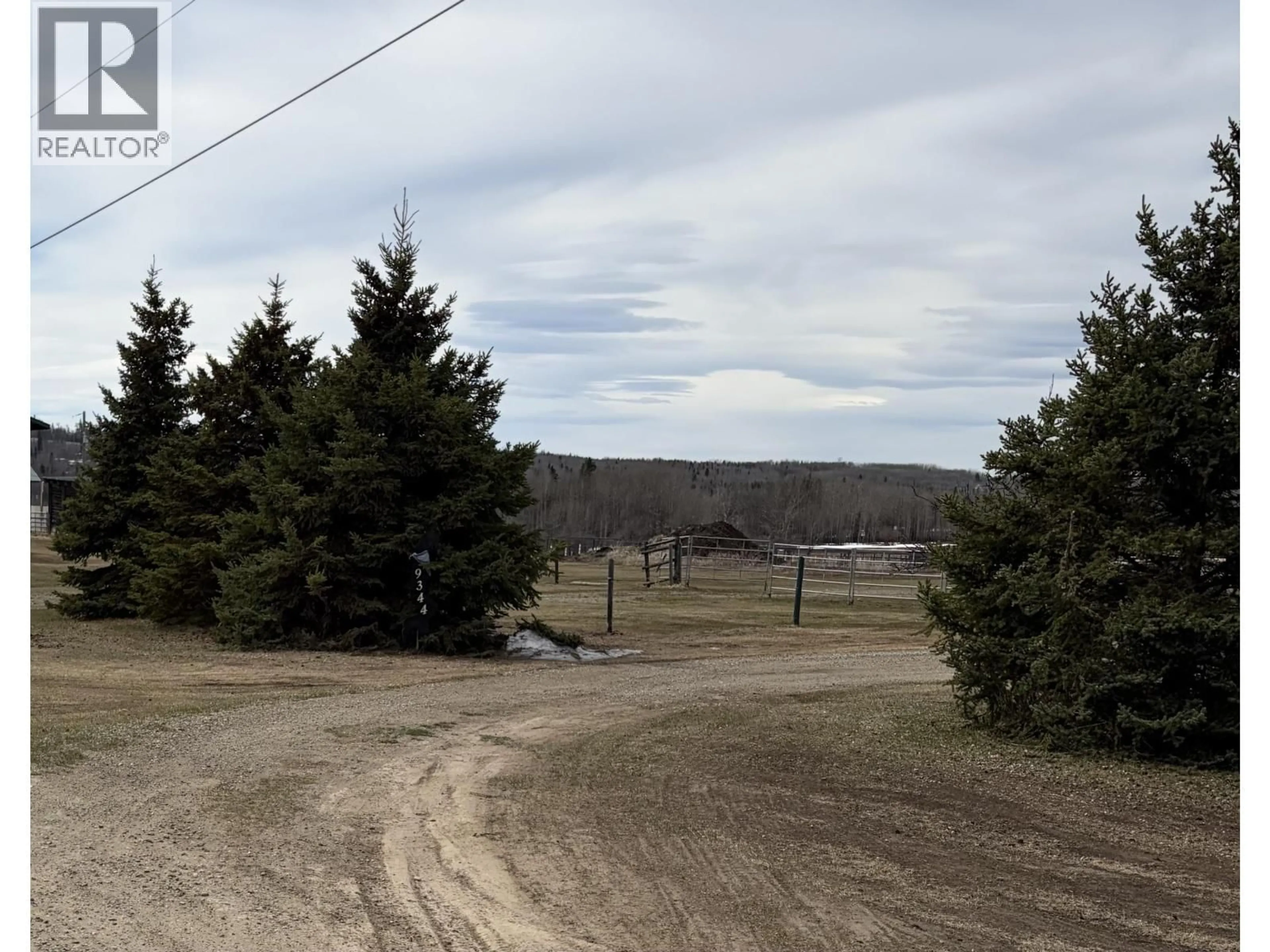 A pic from outside/outdoor area/front of a property/back of a property/a pic from drone, forest/trees view for 9344 97 HIGHWAY, Fort St. John British Columbia V0C1H0