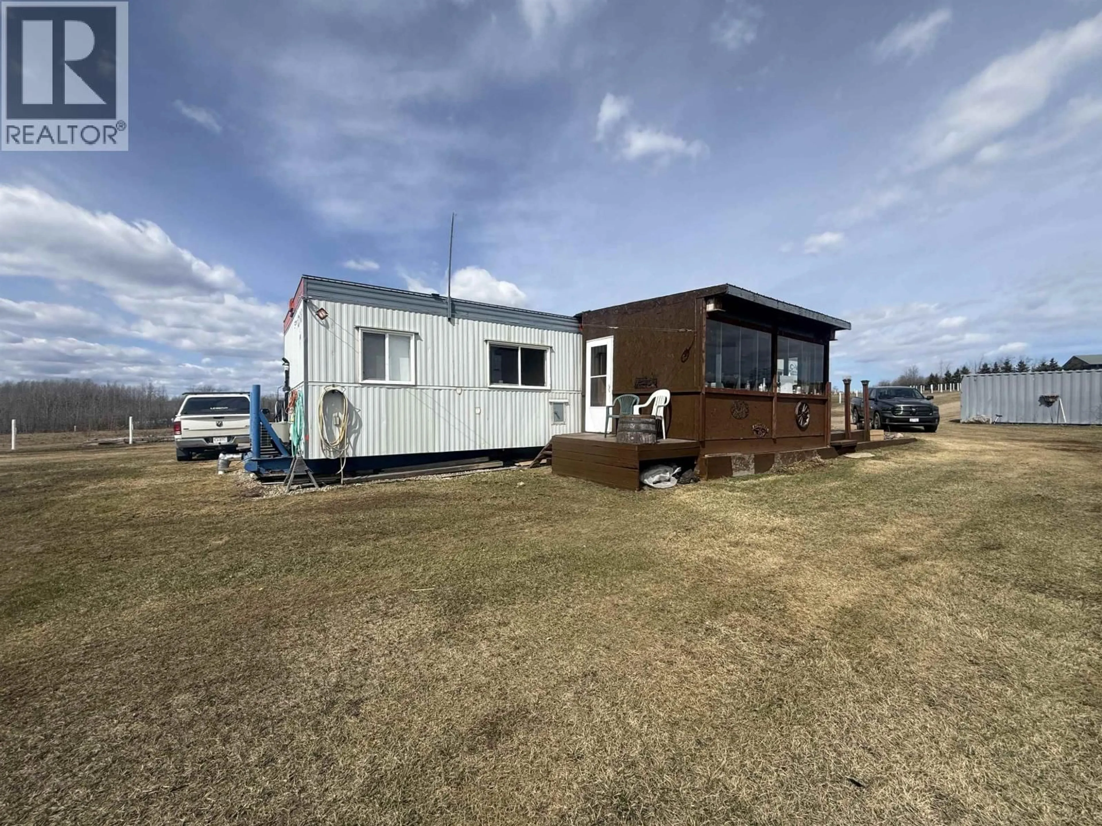 A pic from outside/outdoor area/front of a property/back of a property/a pic from drone, unknown for 9344 97 HIGHWAY, Fort St. John British Columbia V0C1H0