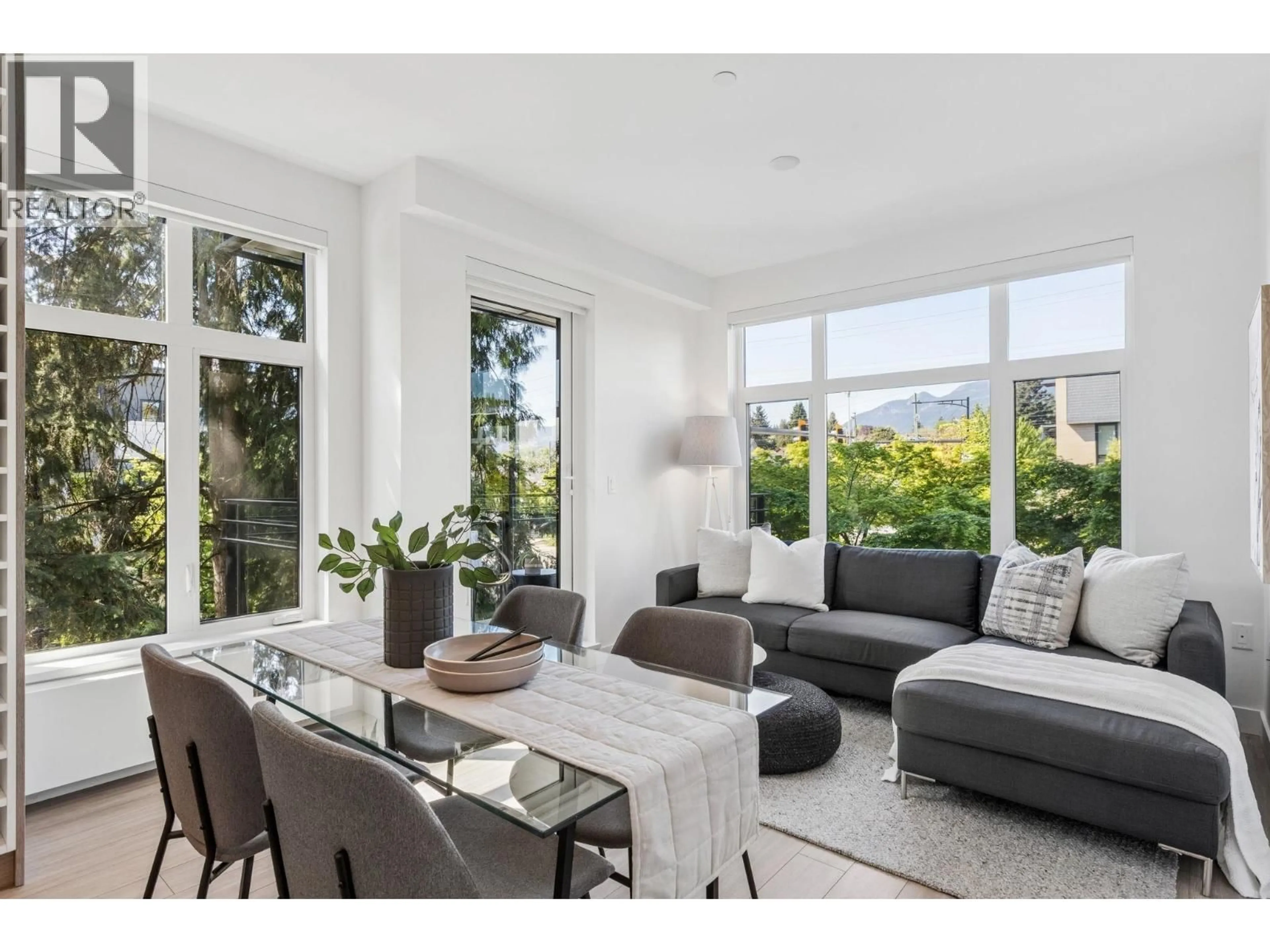 Living room with furniture, unknown for 201 - 707 3RD STREET, North Vancouver British Columbia V7L1G8