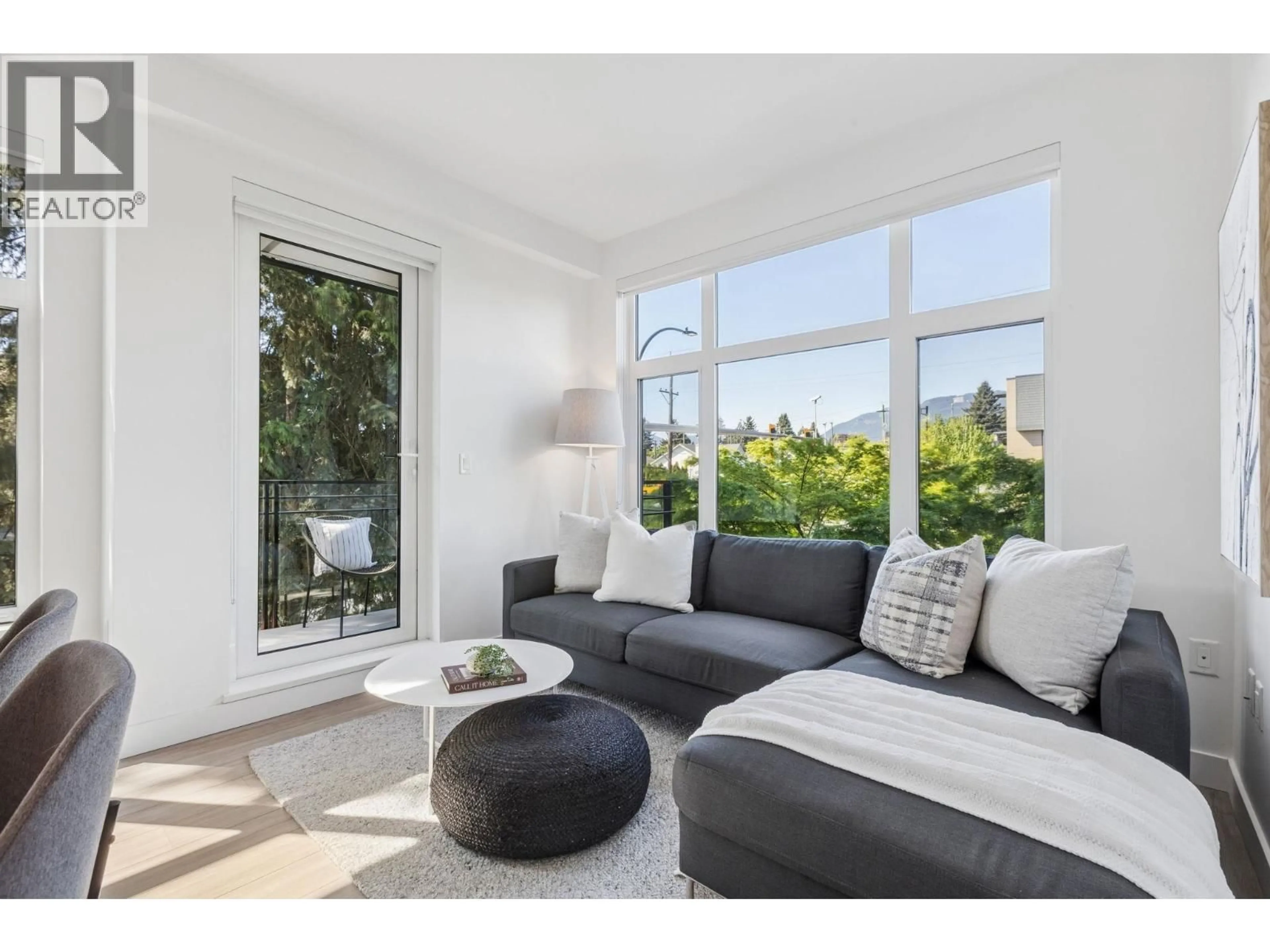 Living room with furniture, unknown for 201 - 707 3RD STREET, North Vancouver British Columbia V7L1G8