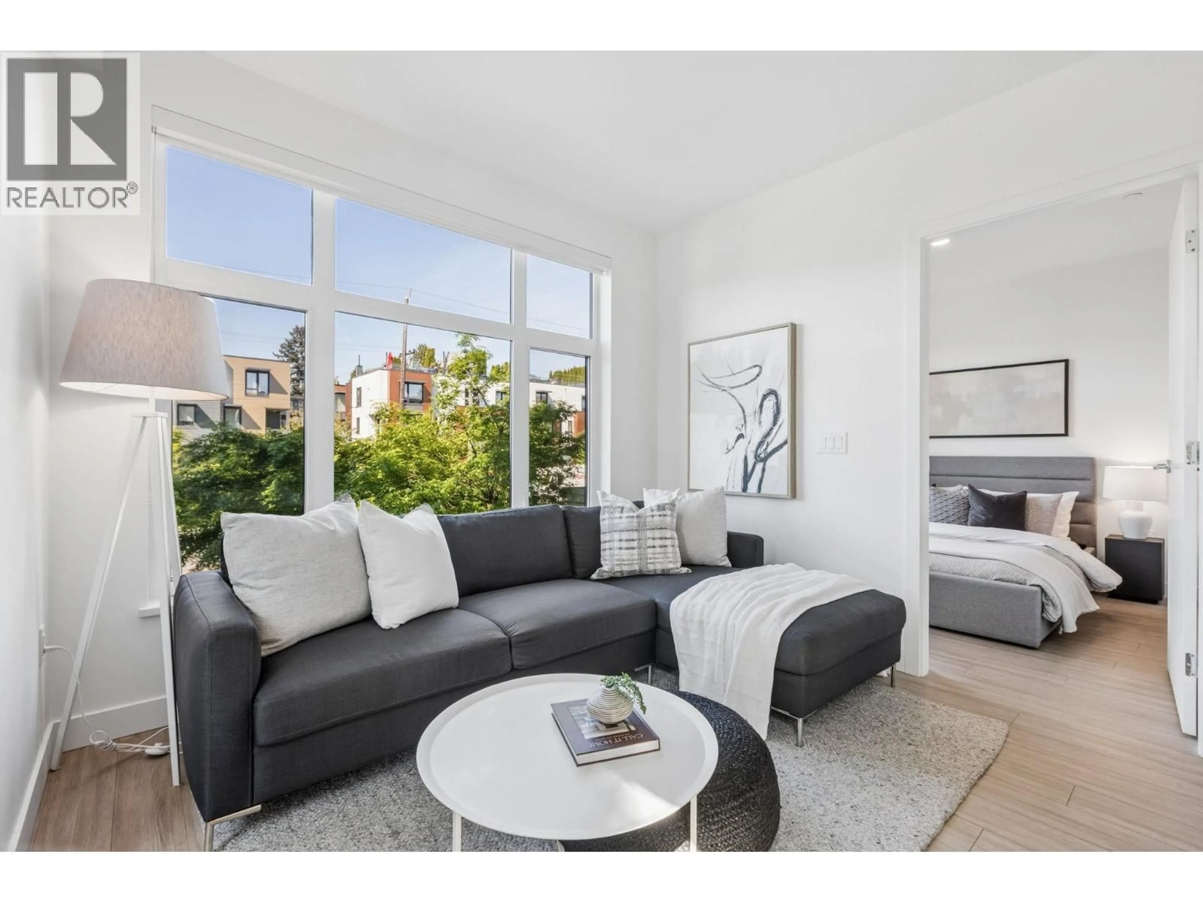 Living room with furniture, unknown for 201 - 707 3RD STREET, North Vancouver British Columbia V7L1G8