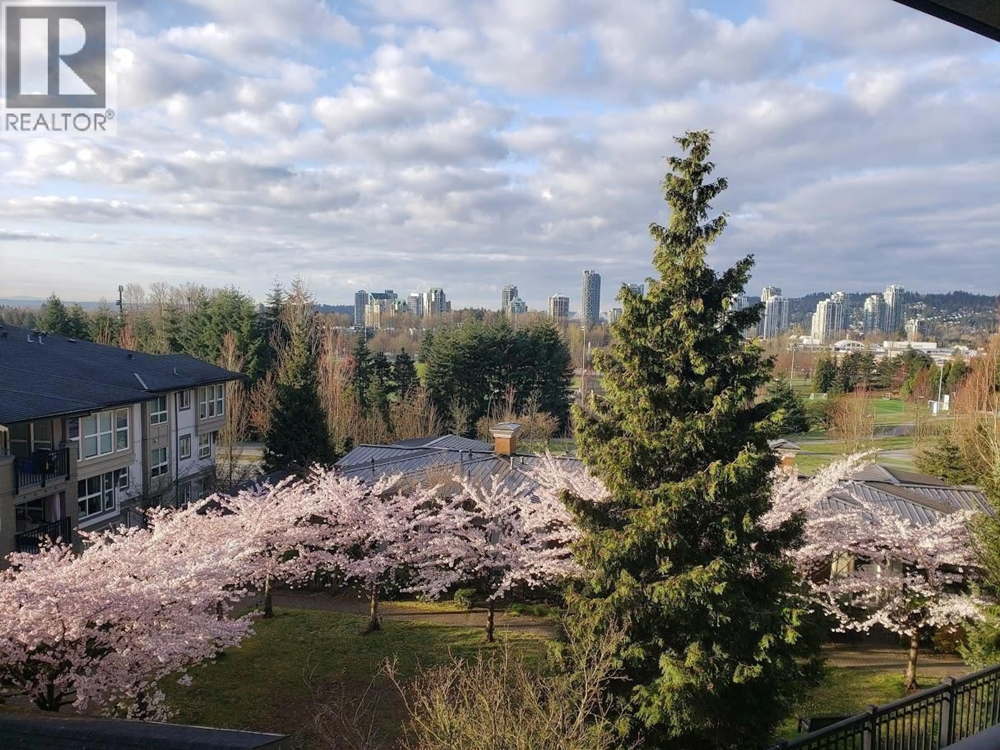 A pic from outside/outdoor area/front of a property/back of a property/a pic from drone, unknown for 201 - 3082 DAYANEE SPRINGS BOULEVARD, Coquitlam British Columbia V3E0A3