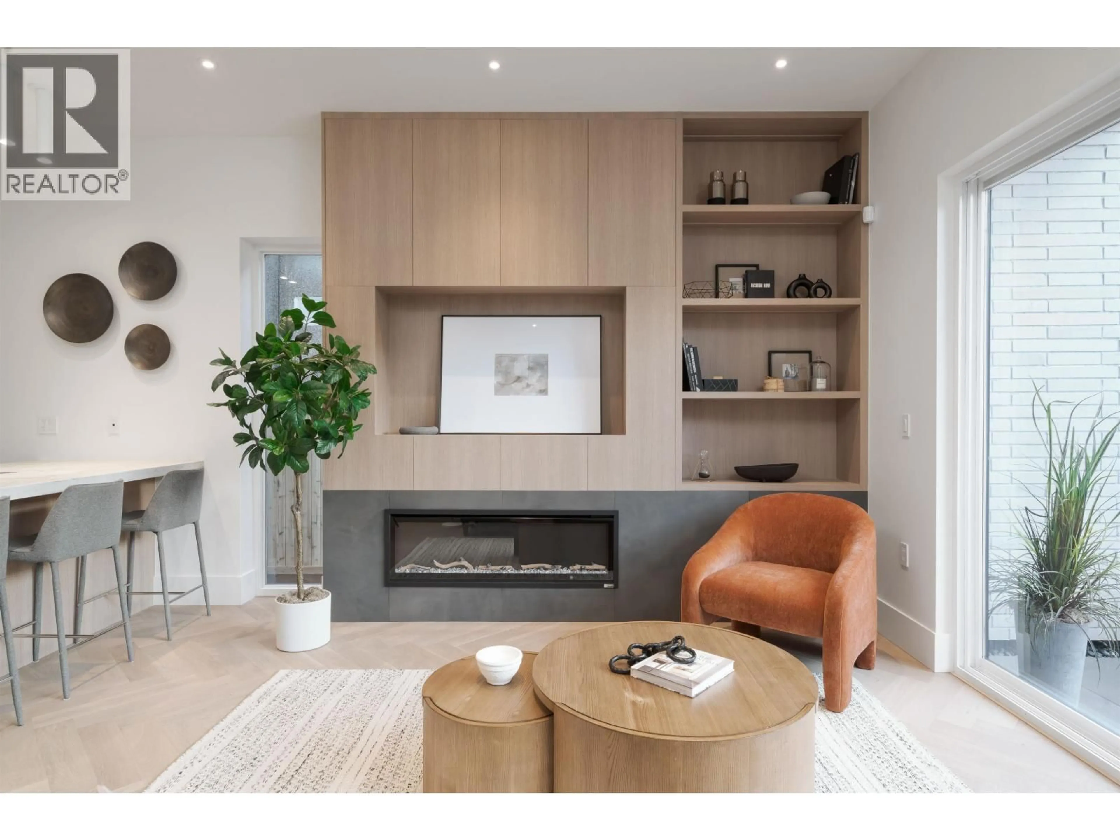 Living room with furniture, wood/laminate floor for 2256 GARDEN DRIVE, Vancouver British Columbia V5N4X2