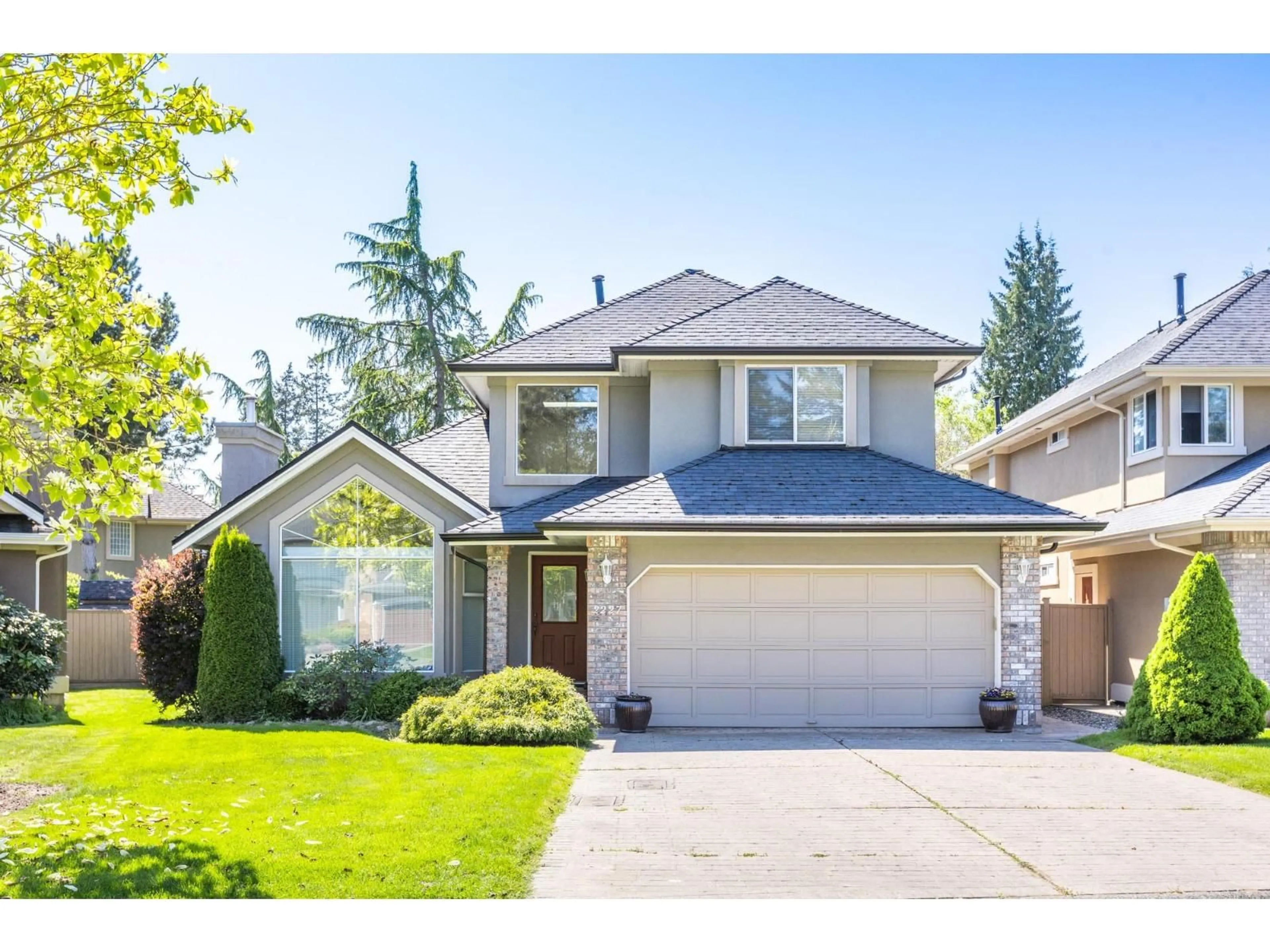 Home with vinyl exterior material, street for 2227 140A STREET, Surrey British Columbia V4A9R8