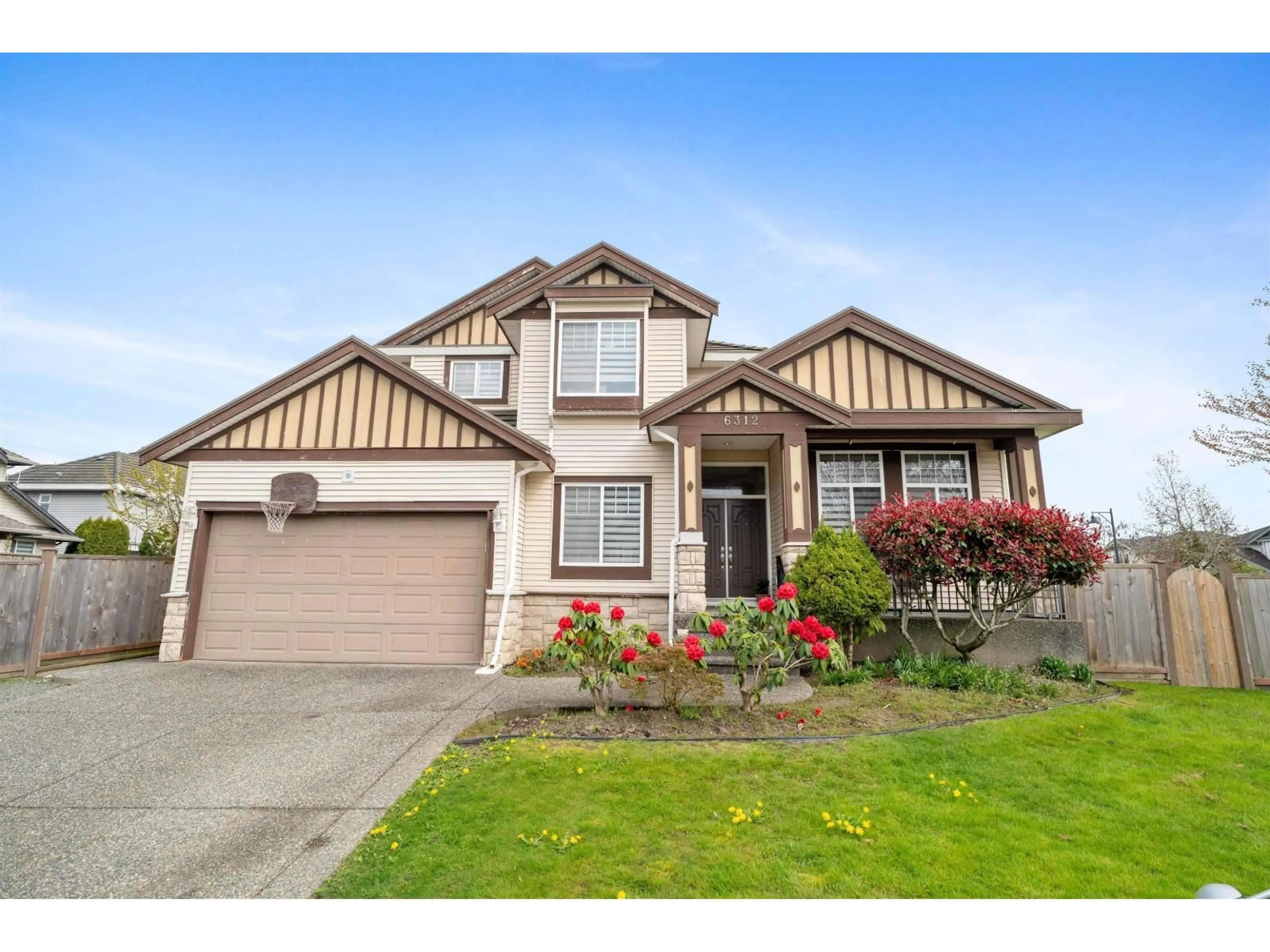 Home with vinyl exterior material, street for 6312 166A STREET, Surrey British Columbia V3S0W1