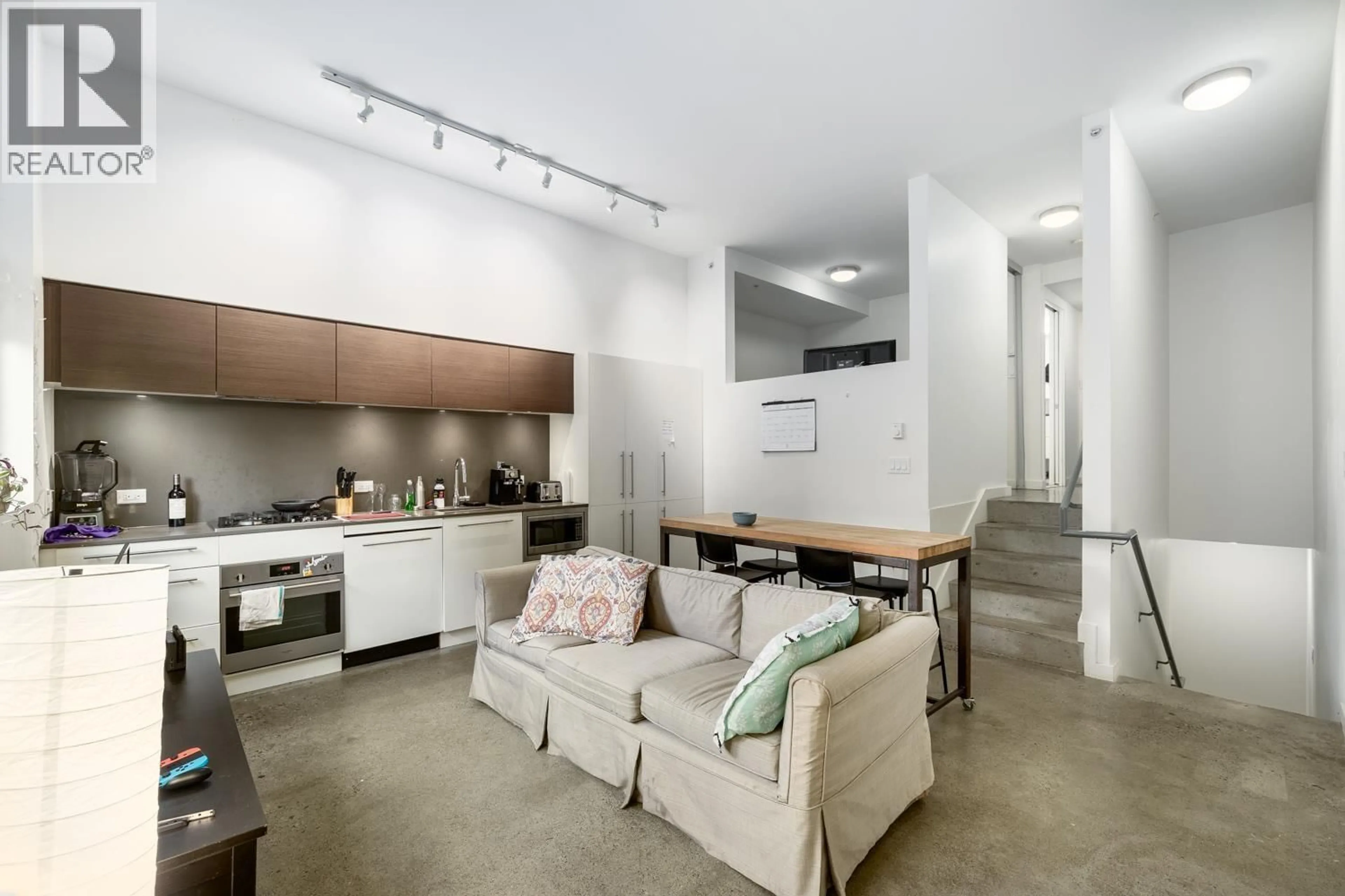 Open concept kitchen, unknown for 208 - 150 CORDOVA STREET, Vancouver British Columbia V6A0E7