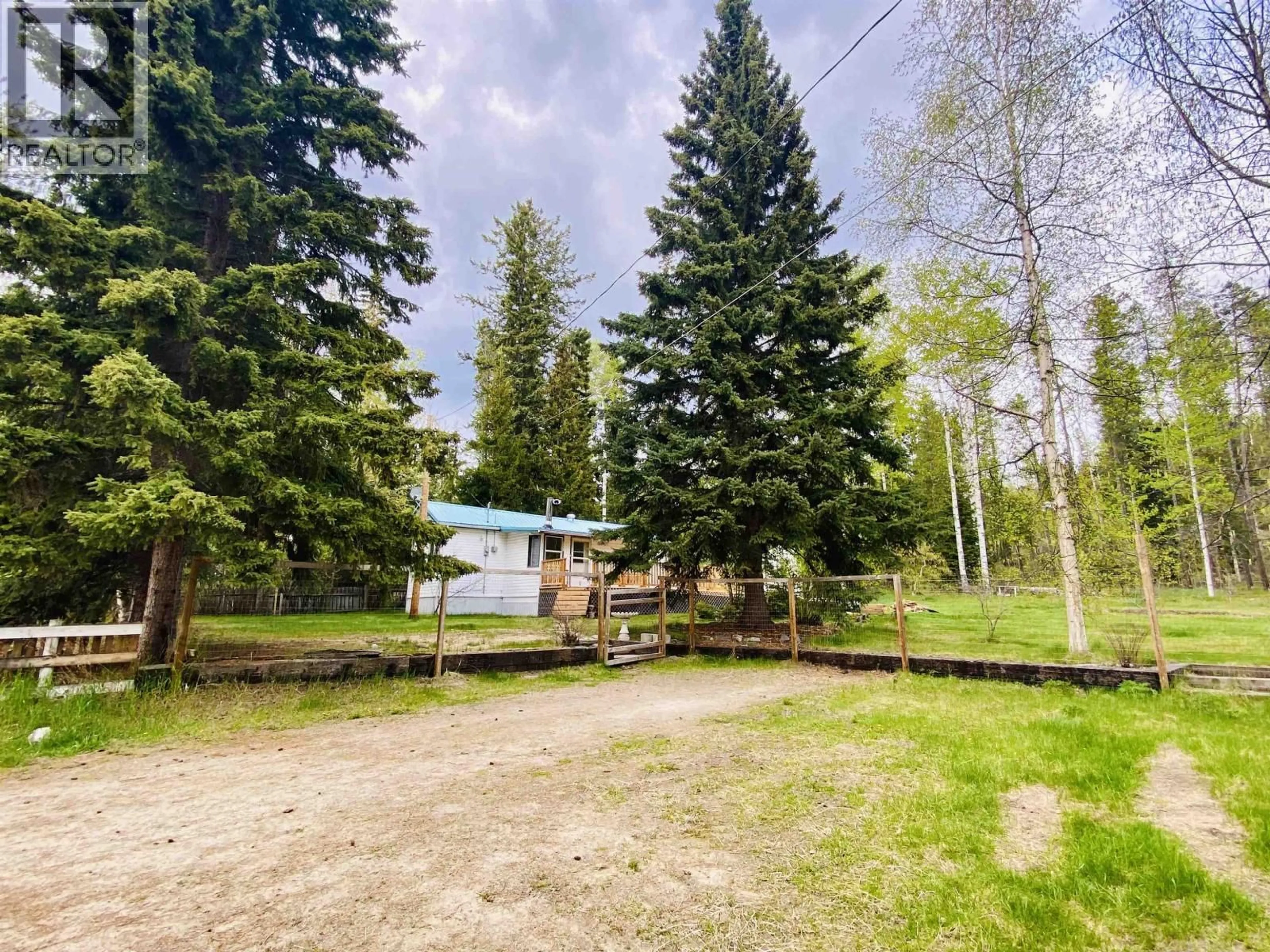 A pic from outside/outdoor area/front of a property/back of a property/a pic from drone, forest/trees view for 1010 MAIN STREET, Valemount British Columbia V0E2Z0