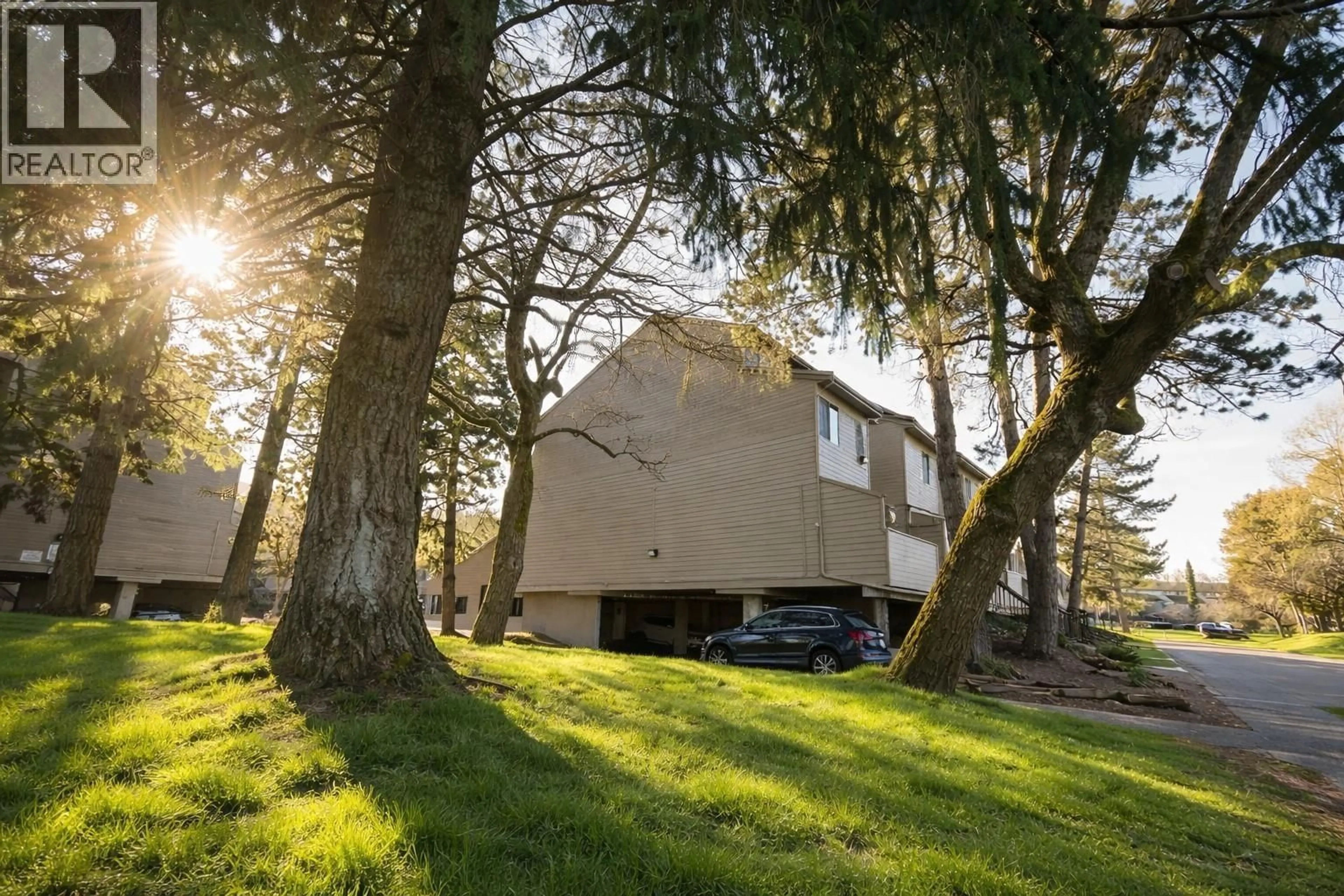 A pic from outside/outdoor area/front of a property/back of a property/a pic from drone, forest/trees view for 214 - 8140 COLONIAL DRIVE, Richmond British Columbia V7C4T7