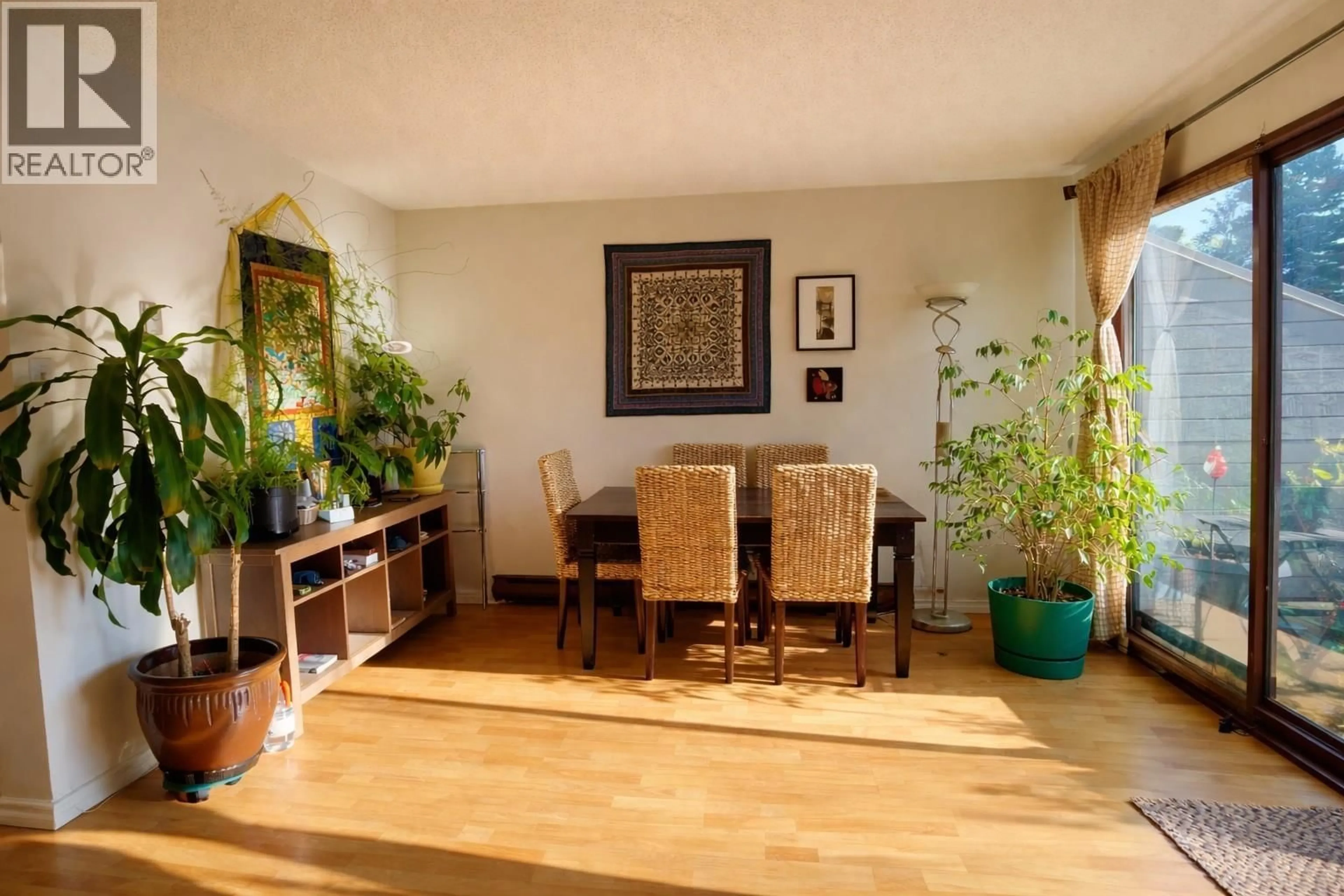 Dining room, wood/laminate floor for 214 - 8140 COLONIAL DRIVE, Richmond British Columbia V7C4T7