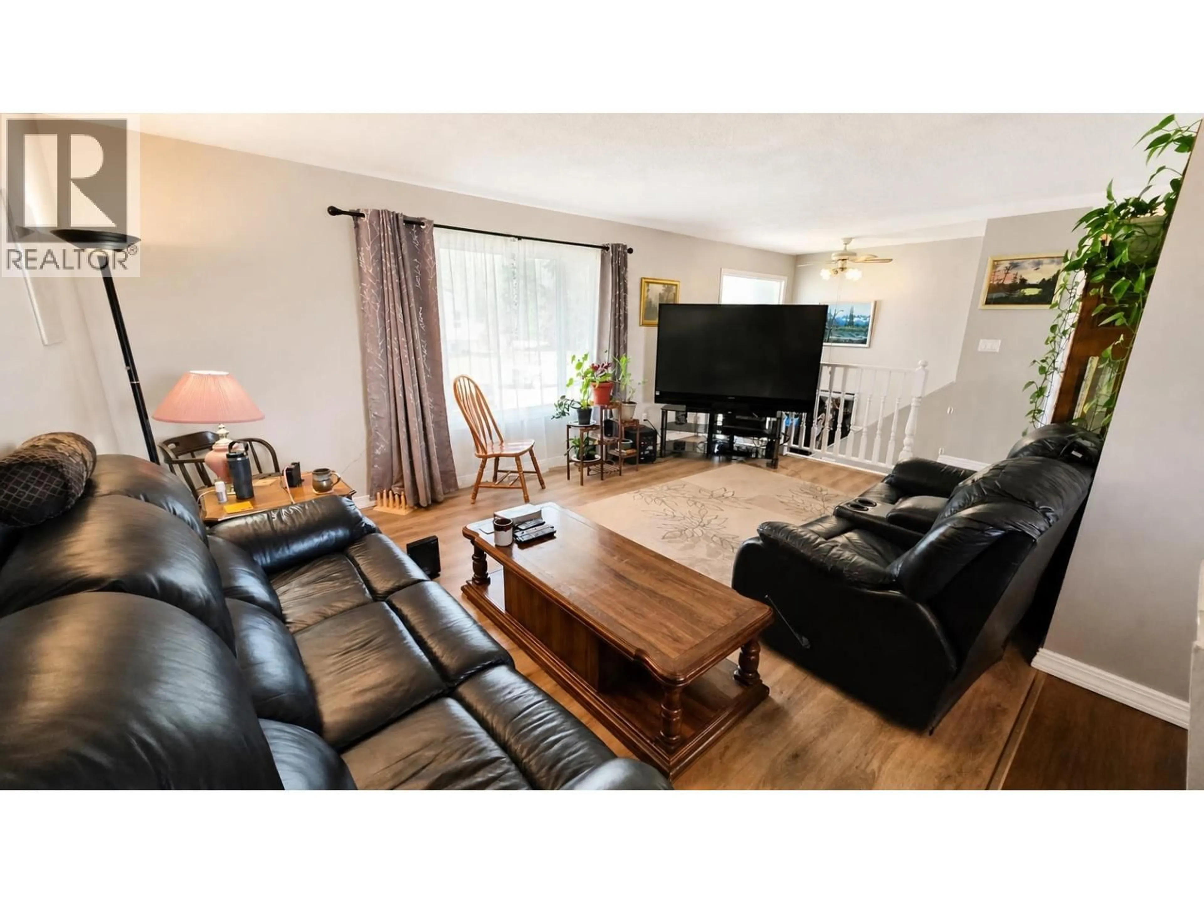 Living room with furniture, wood/laminate floor for 1965 SULLIVAN WAY, Houston British Columbia V0J1Z0