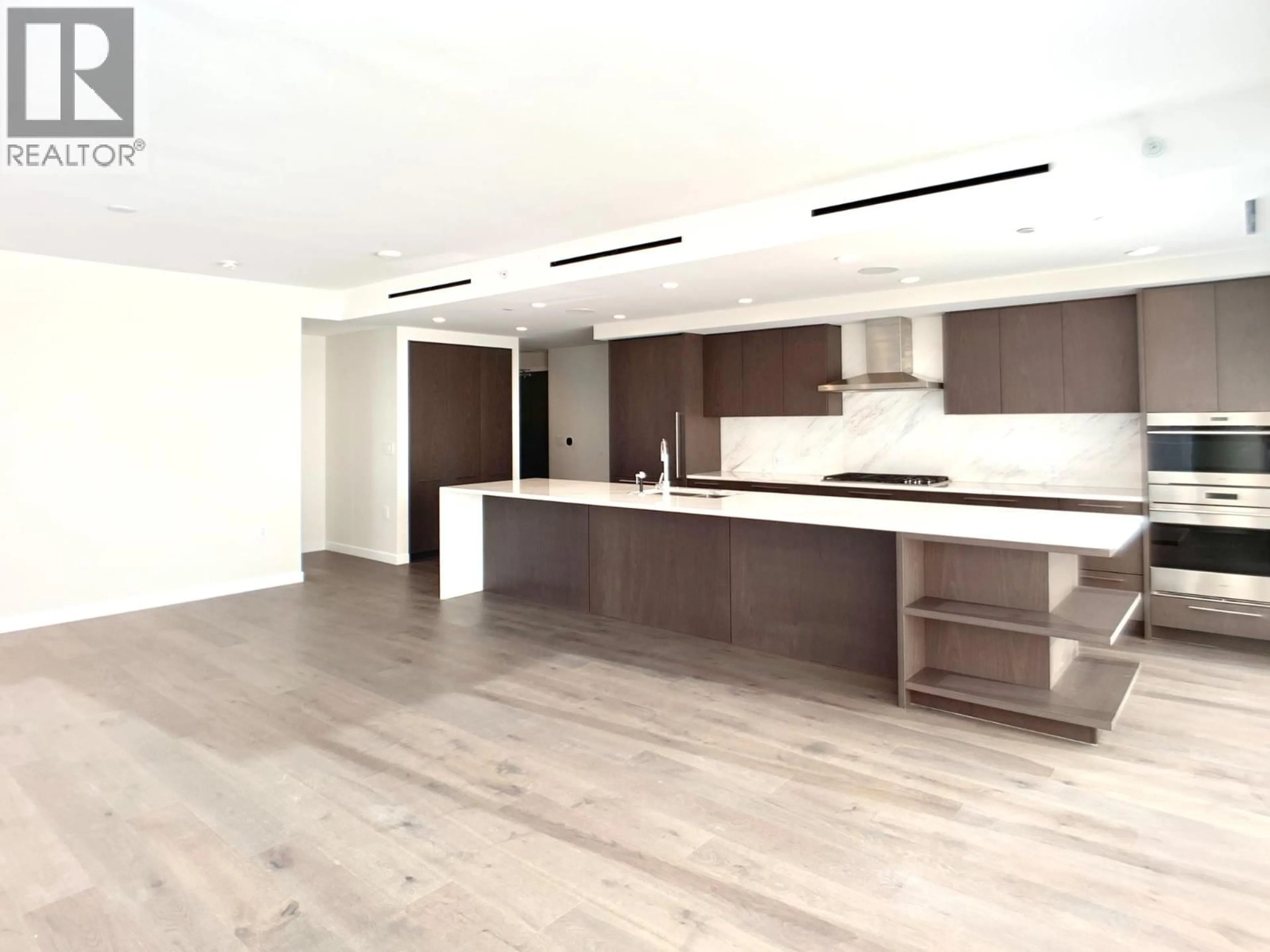 Open concept kitchen, wood/laminate floor for 2504 - 1335 HOWE STREET, Vancouver British Columbia V6Z0H1