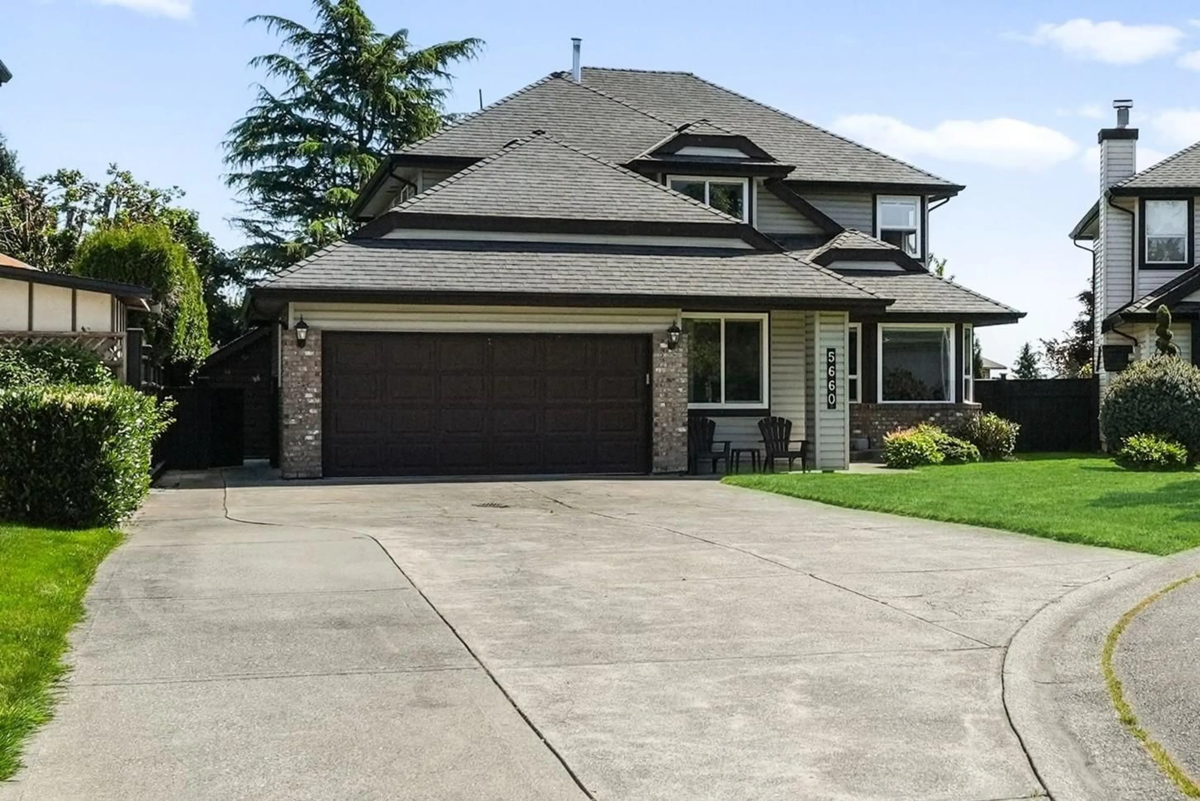 Home with vinyl exterior material, street for 5660 187 STREET, Surrey British Columbia V3S7N3