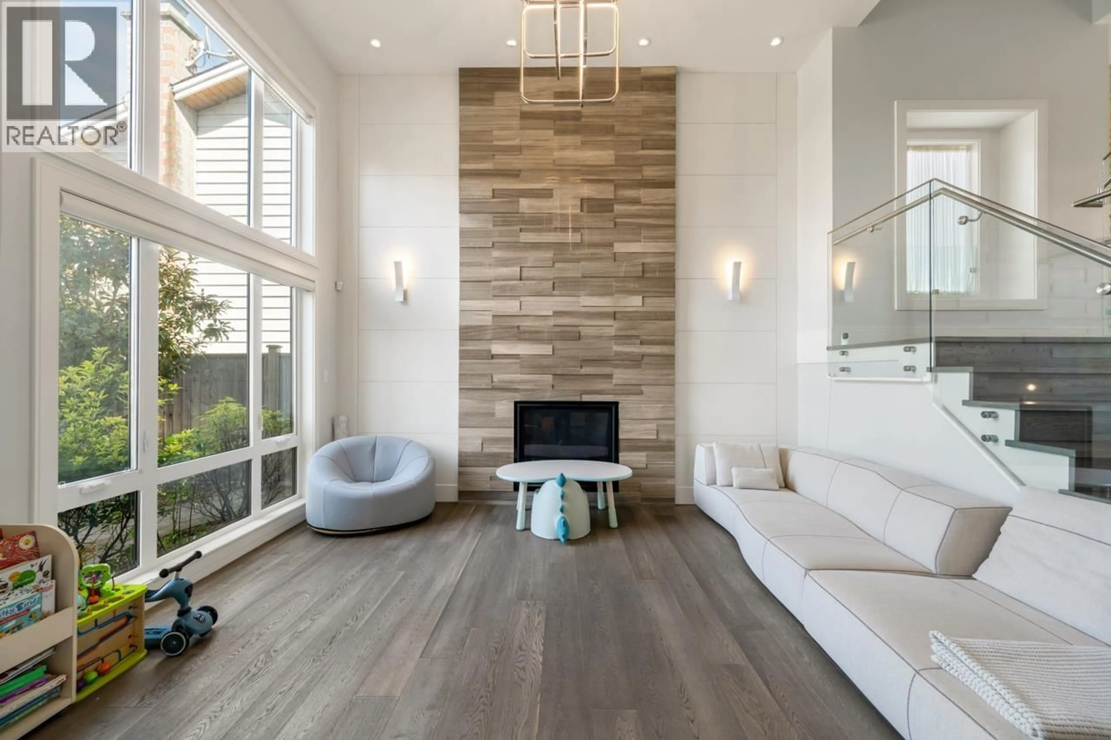 Living room with furniture, wood/laminate floor for 4480 LANCELOT DRIVE, Richmond British Columbia V7C4S3