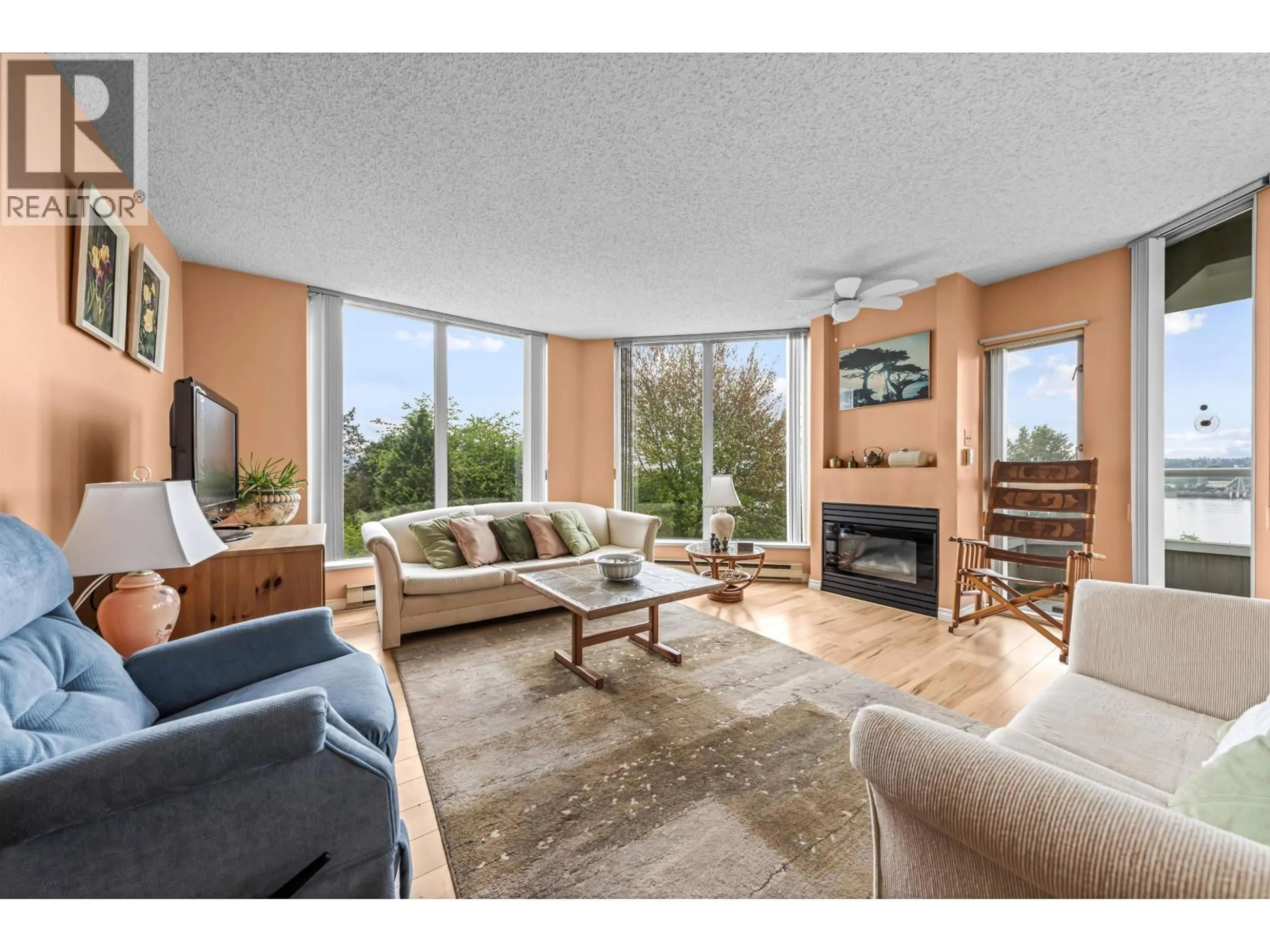Living room with furniture, unknown for 305 - 69 JAMIESON COURT, New Westminster British Columbia V3L5R3