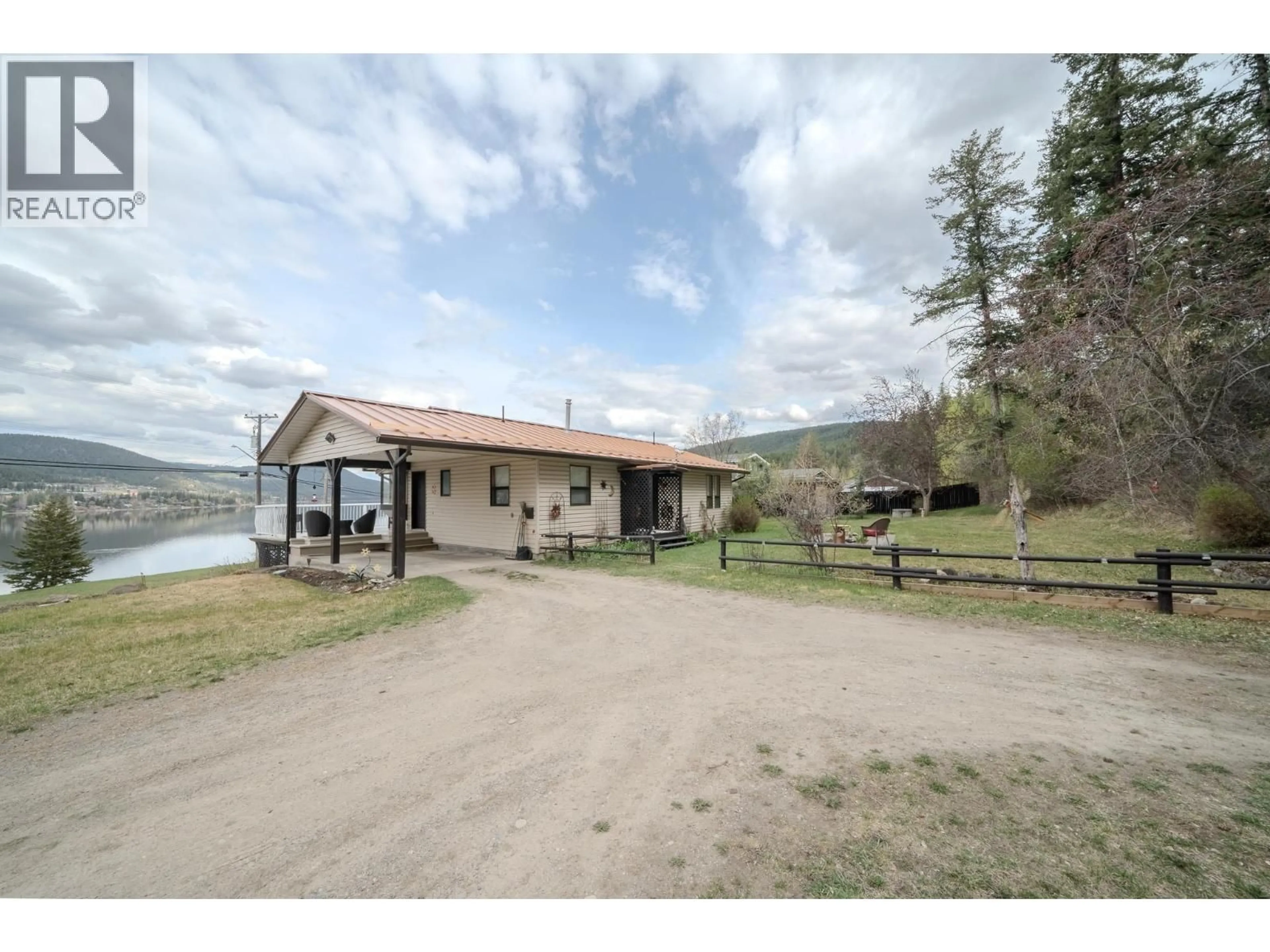 A pic from outside/outdoor area/front of a property/back of a property/a pic from drone, water/lake/river/ocean view for 1273 SOUTH LAKESIDE DRIVE, Williams Lake British Columbia V2G3A7