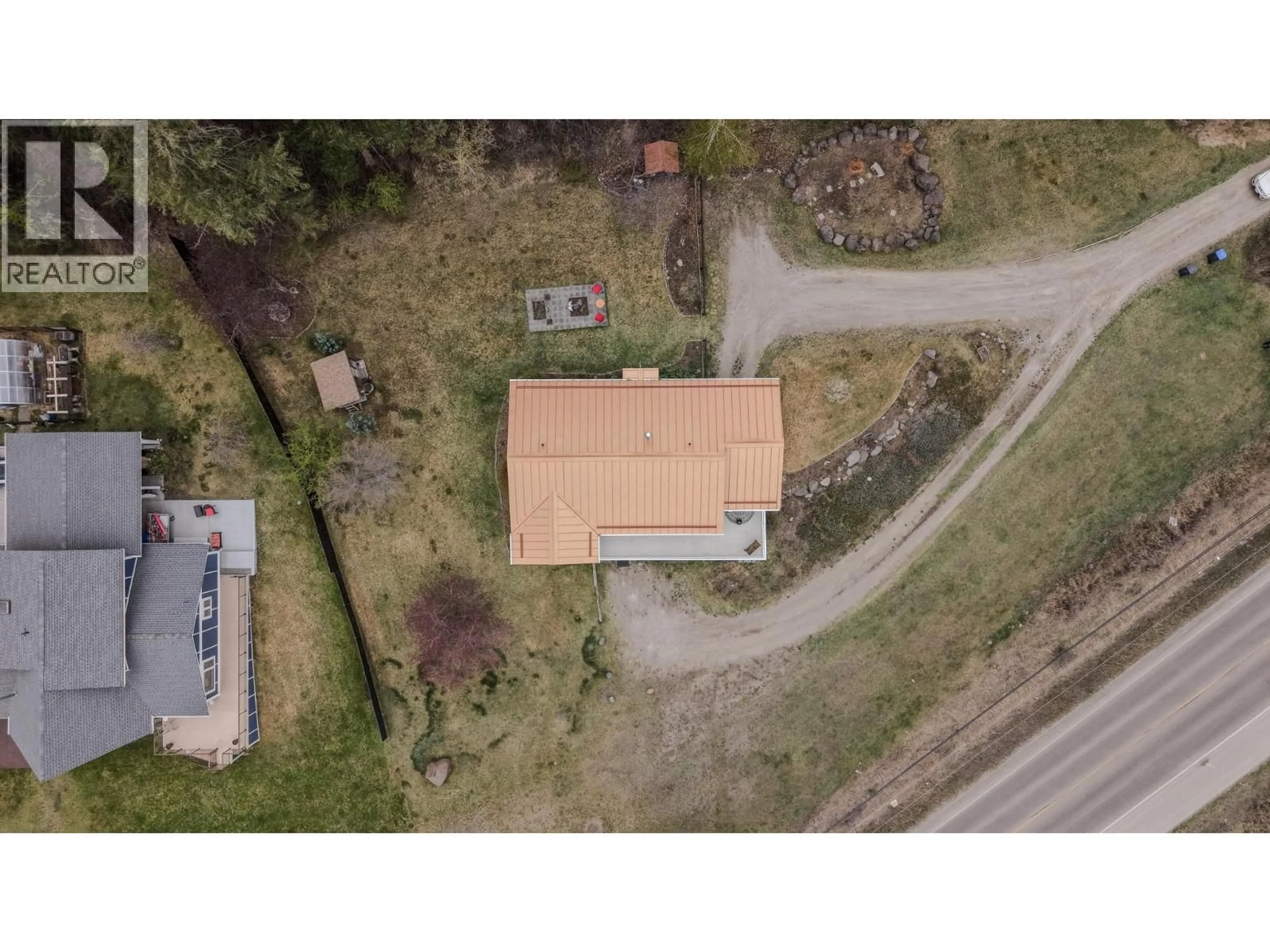 A pic from outside/outdoor area/front of a property/back of a property/a pic from drone, street for 1273 SOUTH LAKESIDE DRIVE, Williams Lake British Columbia V2G3A7