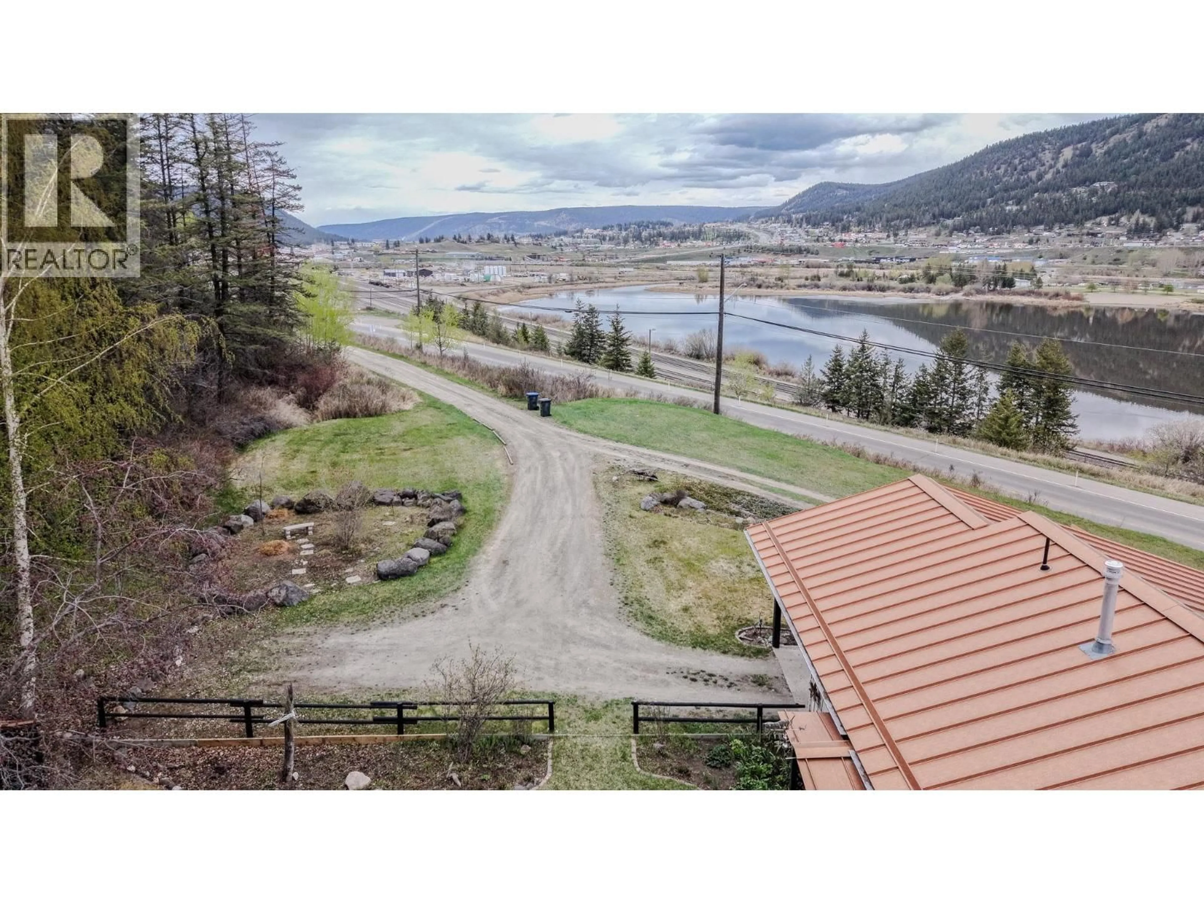 A pic from outside/outdoor area/front of a property/back of a property/a pic from drone, water/lake/river/ocean view for 1273 SOUTH LAKESIDE DRIVE, Williams Lake British Columbia V2G3A7