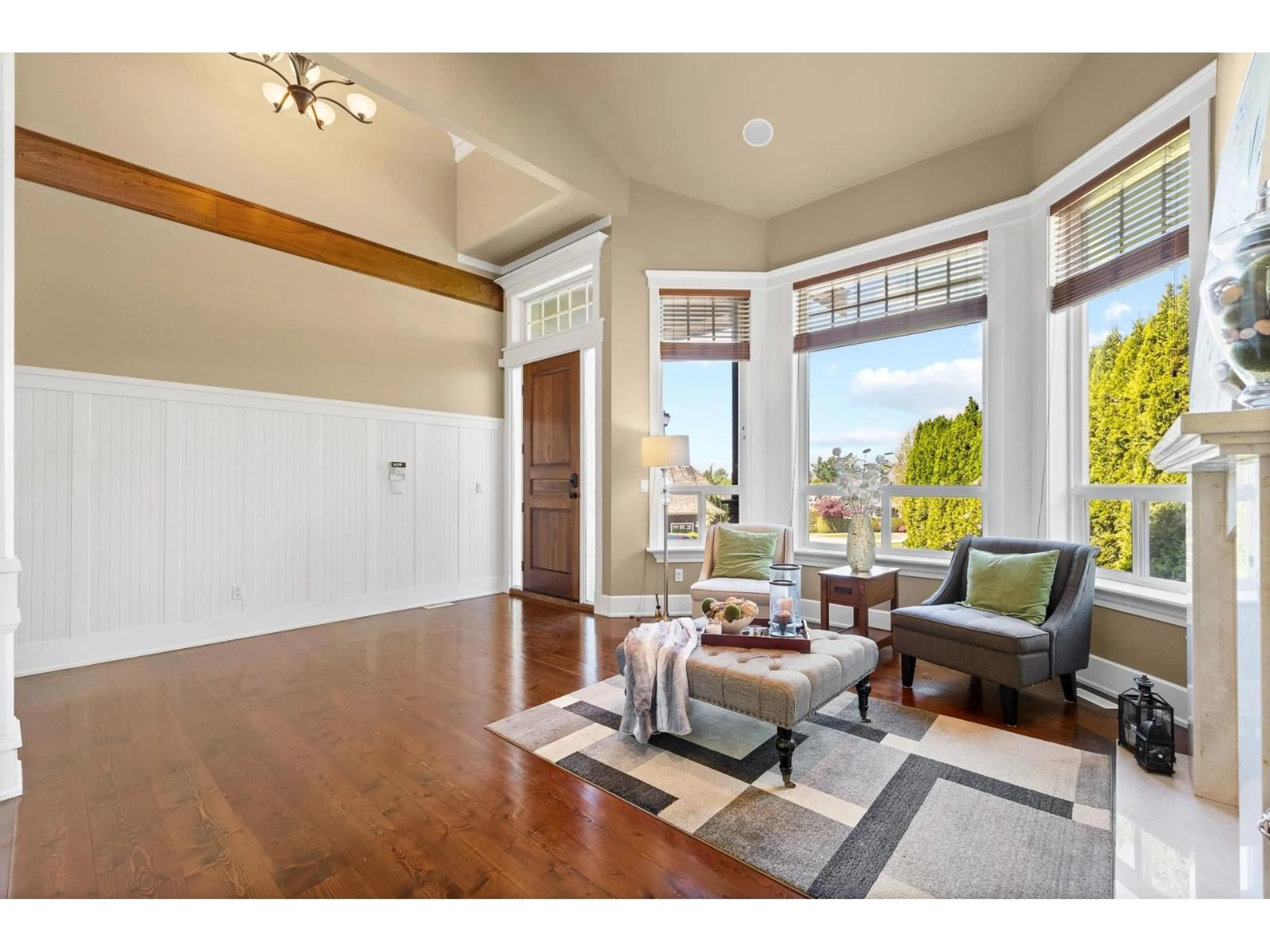 Living room with furniture, wood/laminate floor for 3079 162 STREET, Surrey British Columbia V3Z7E1